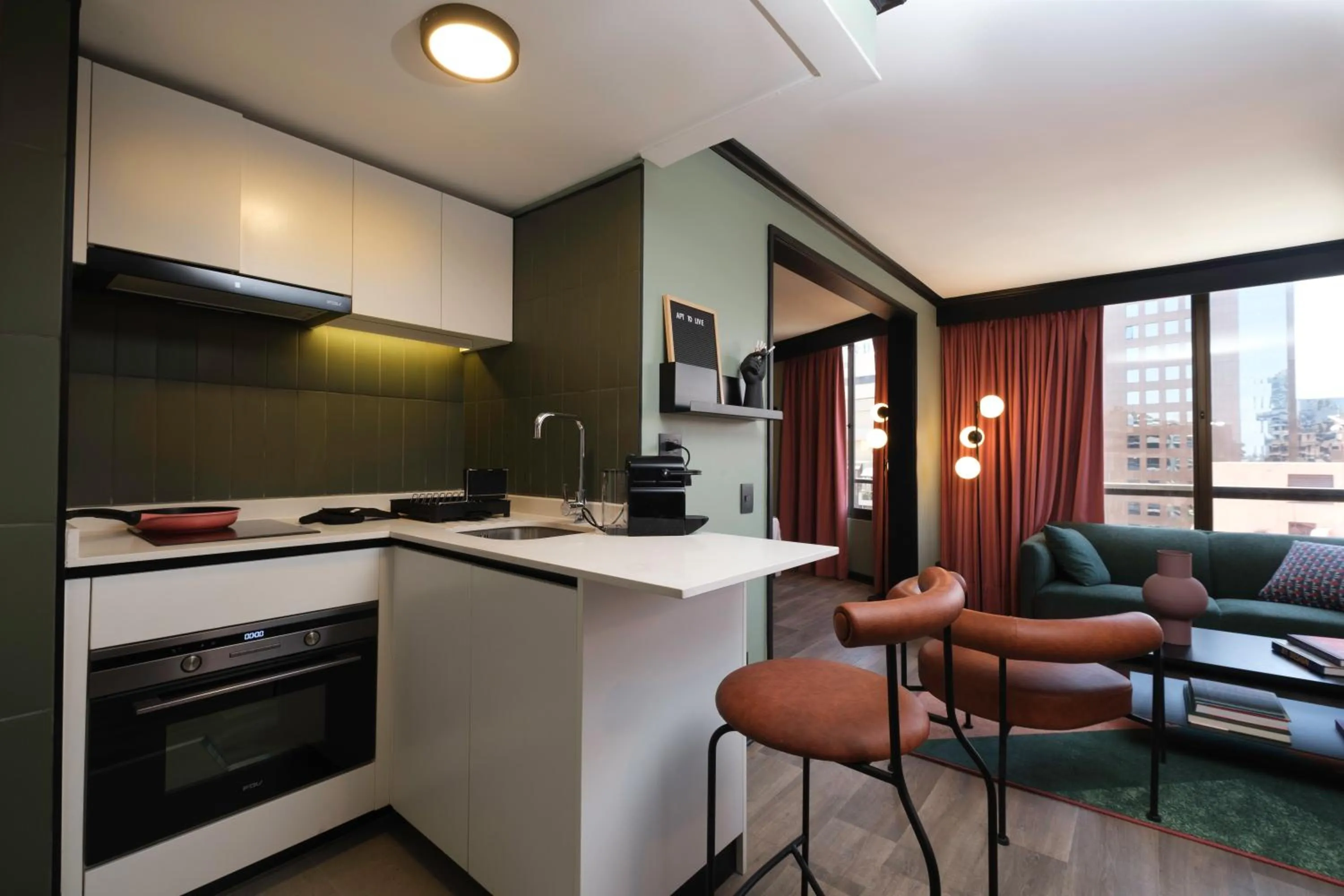 Kitchen or kitchenette in APT Serviced Apartments Santiago