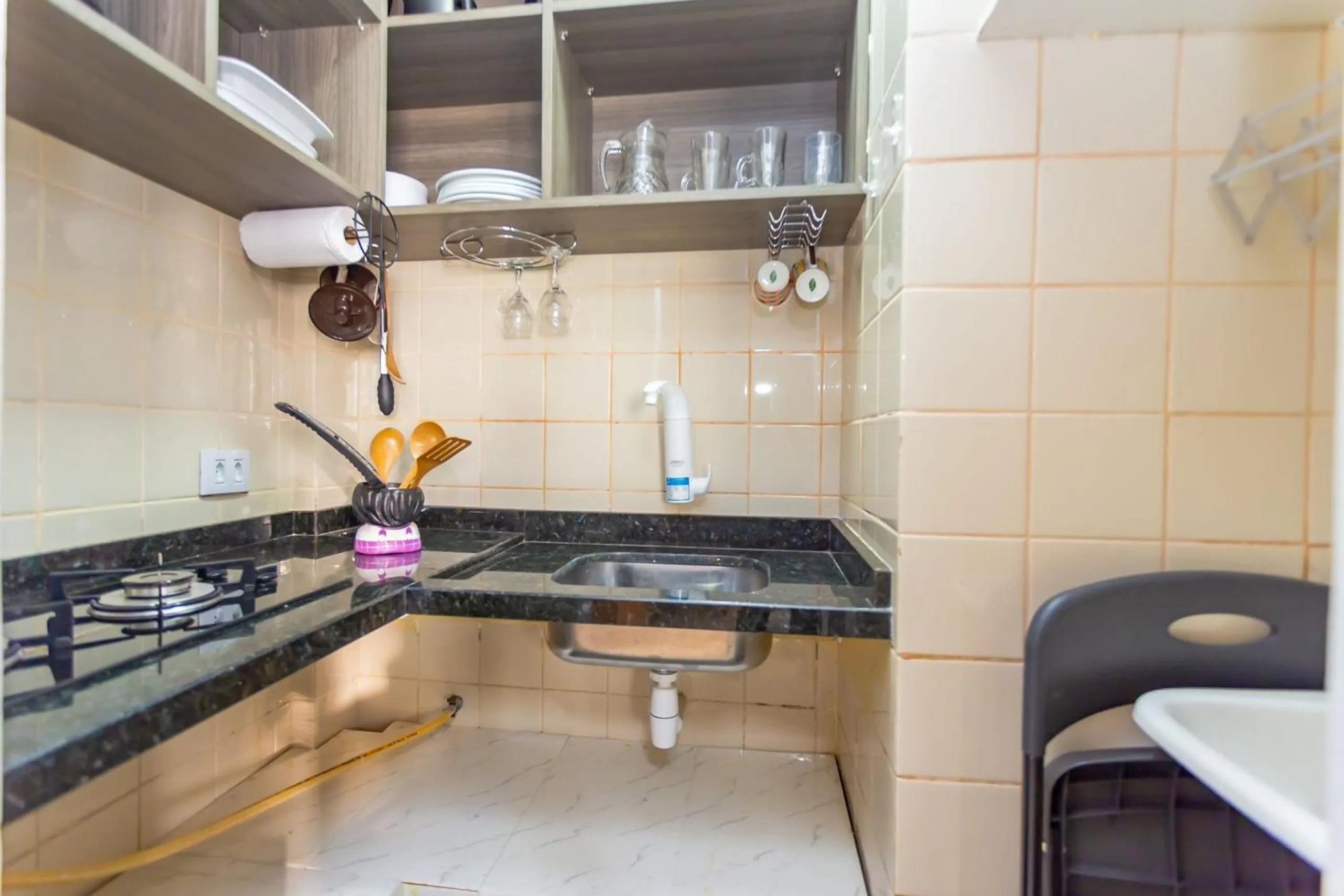 Kitchen or kitchenette in Ed. Charlie Chaplin | Prédio no coração de Curitiba | Gonzaga Stays