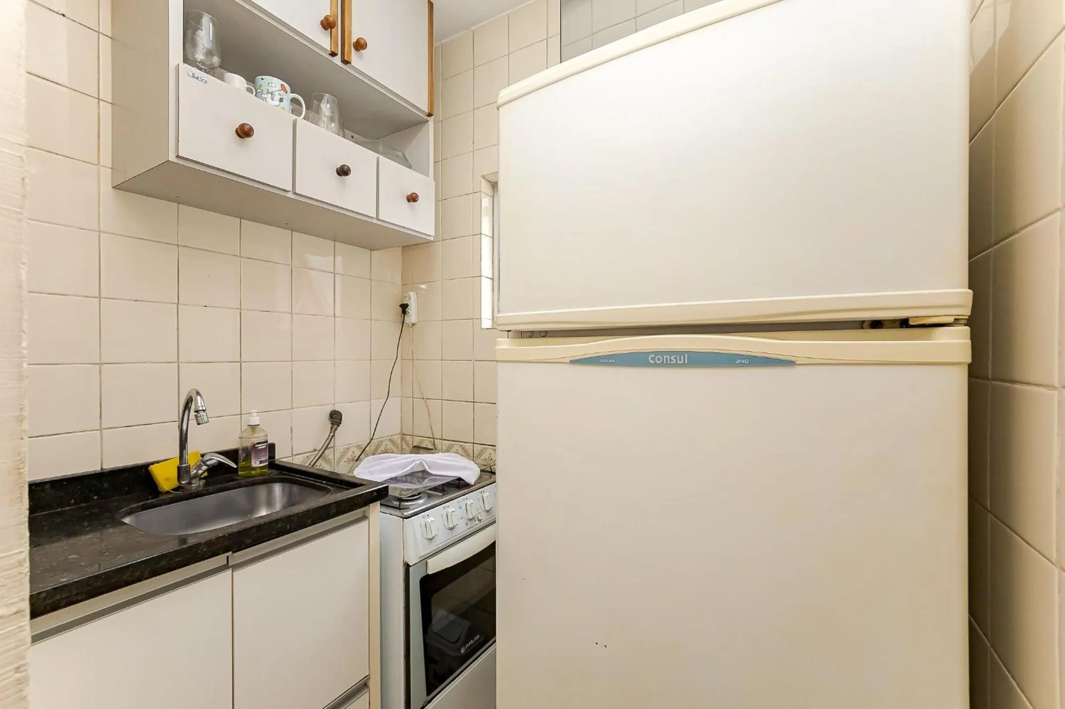 Kitchen or kitchenette in Ed. Charlie Chaplin | Prédio no coração de Curitiba | Gonzaga Stays