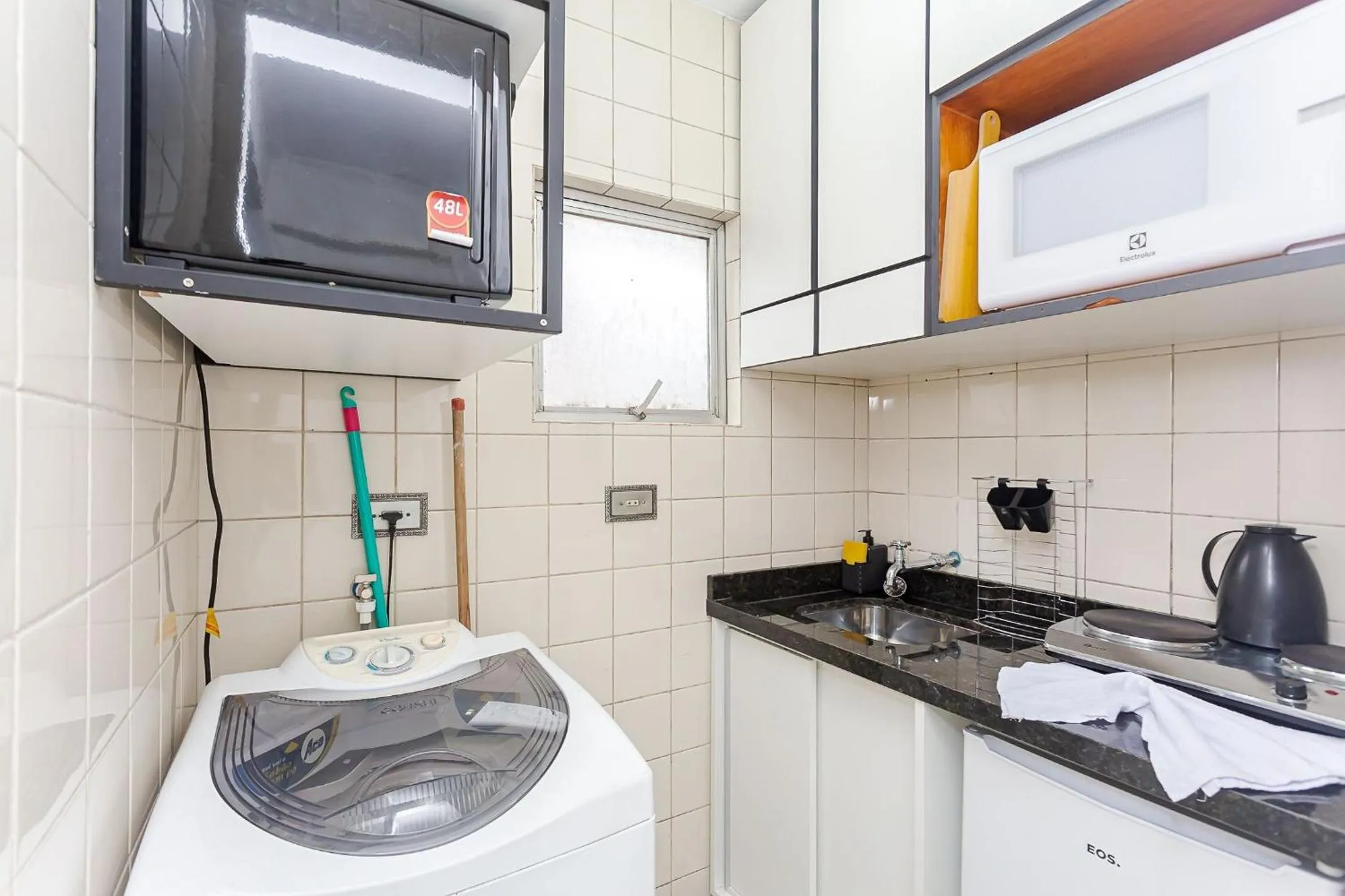 Kitchen or kitchenette in Ed. Charlie Chaplin | Prédio no coração de Curitiba | Gonzaga Stays