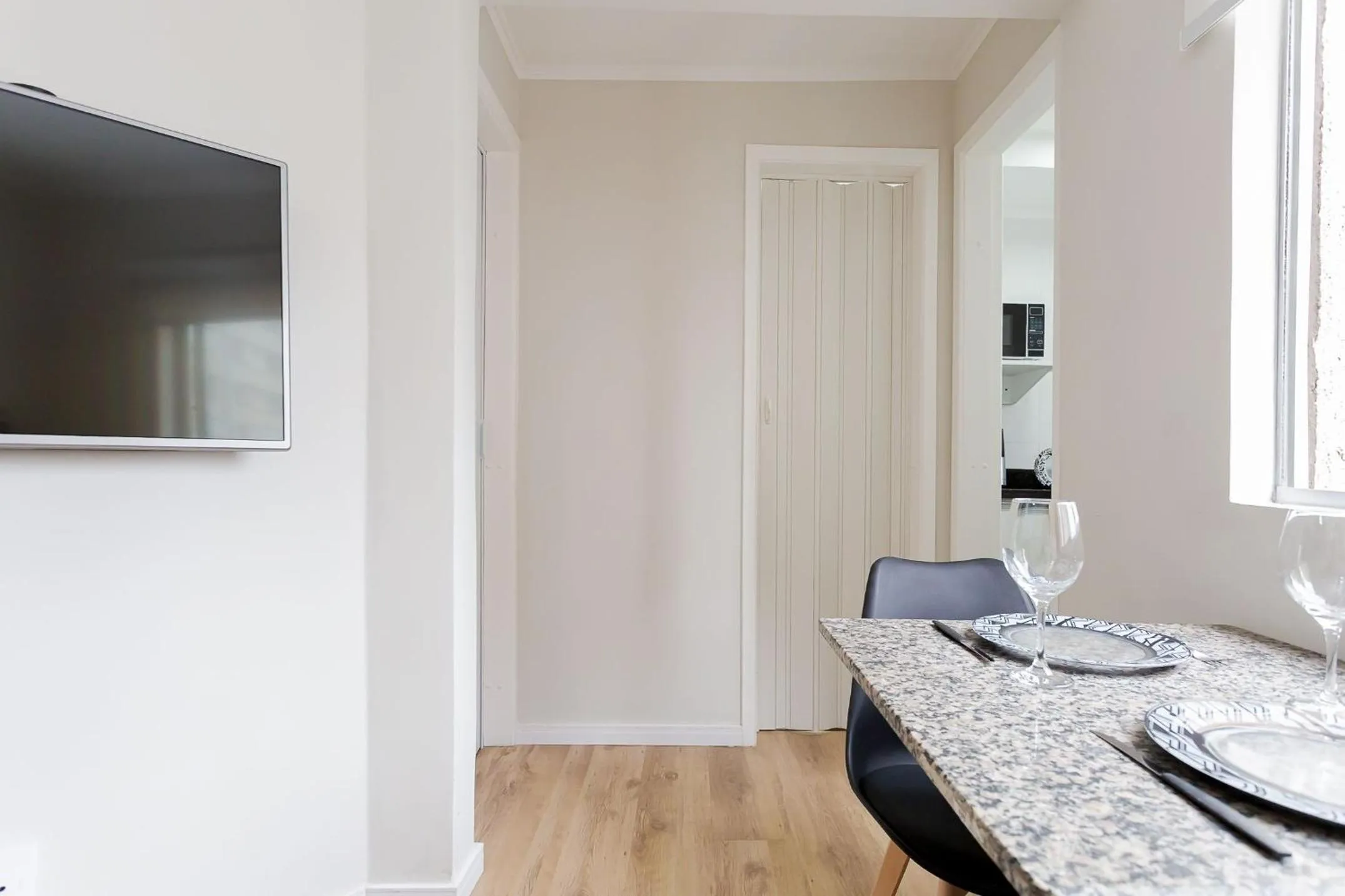 Living room in Ed. Charlie Chaplin | Prédio no coração de Curitiba | Gonzaga Stays