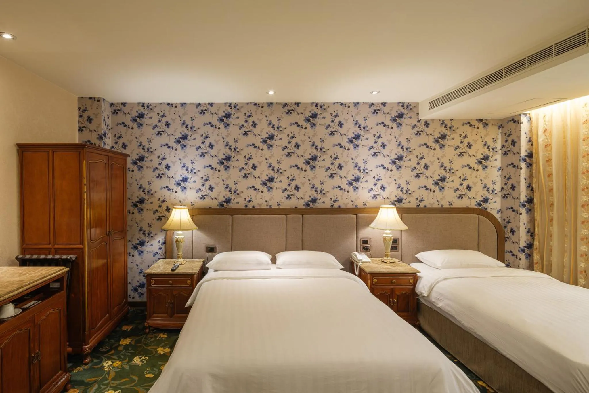 Bed in Grand Pleasure Spring Hotel