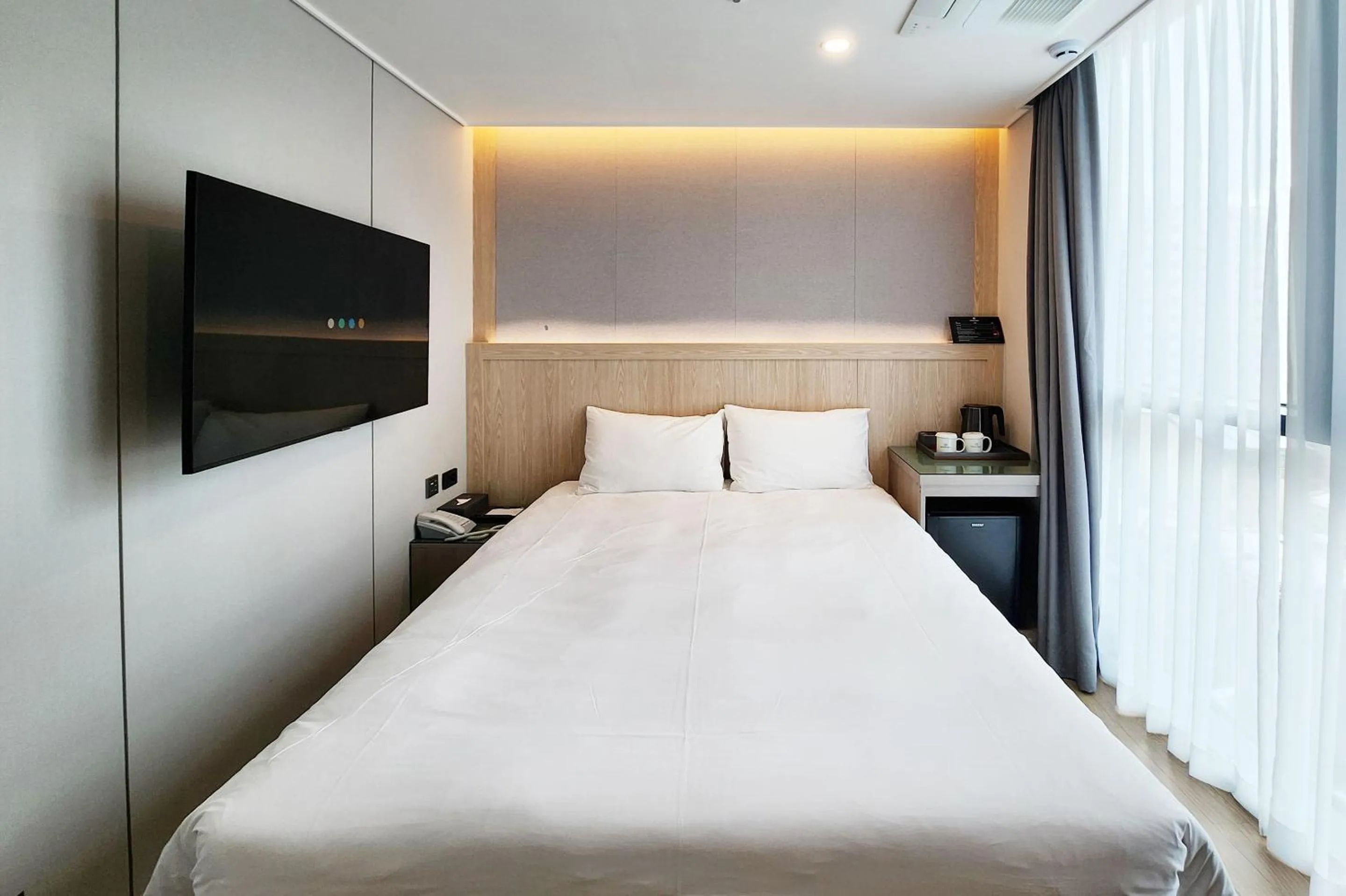 Bed in Jeju Bolton Hotel