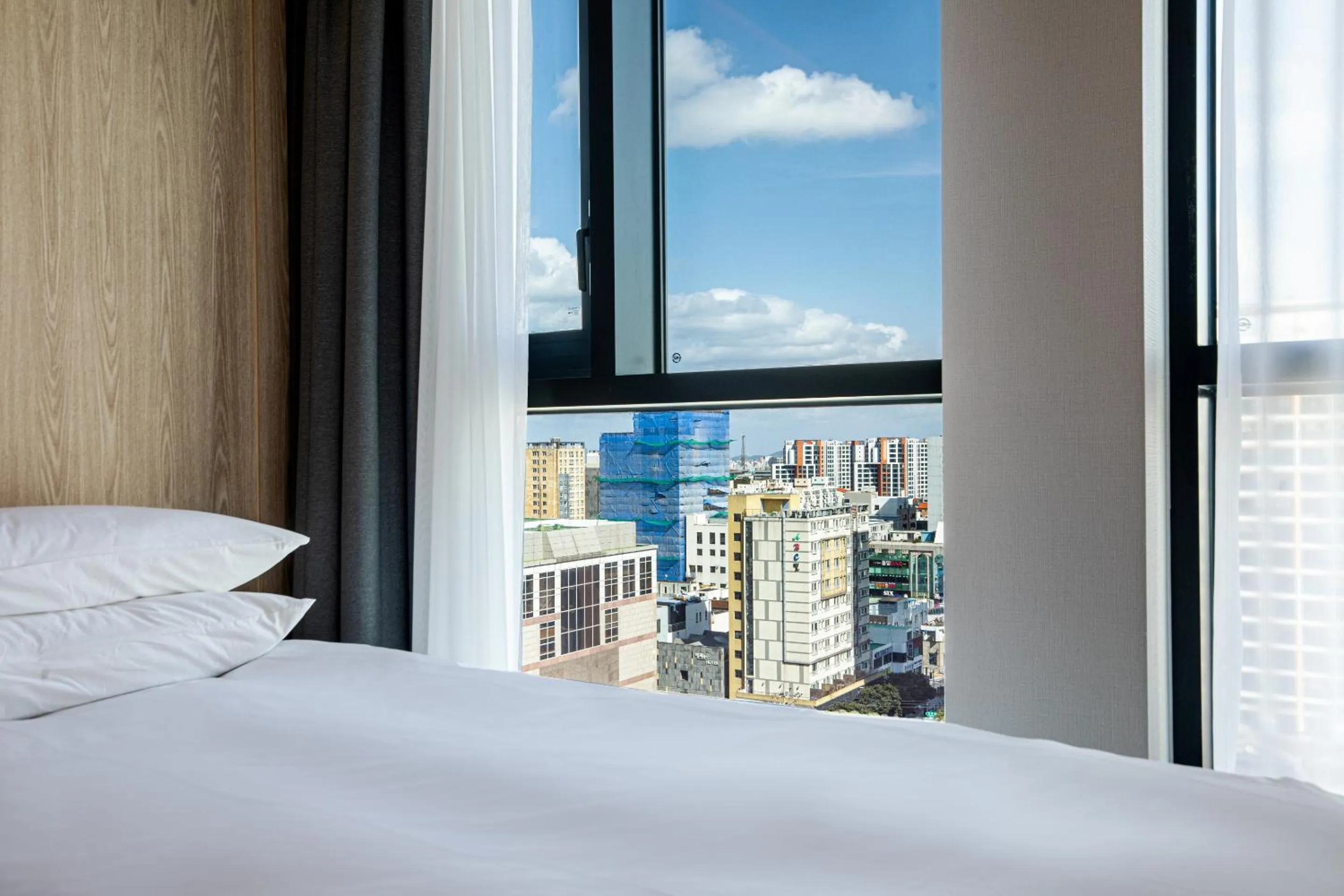 Bed in Jeju Bolton Hotel