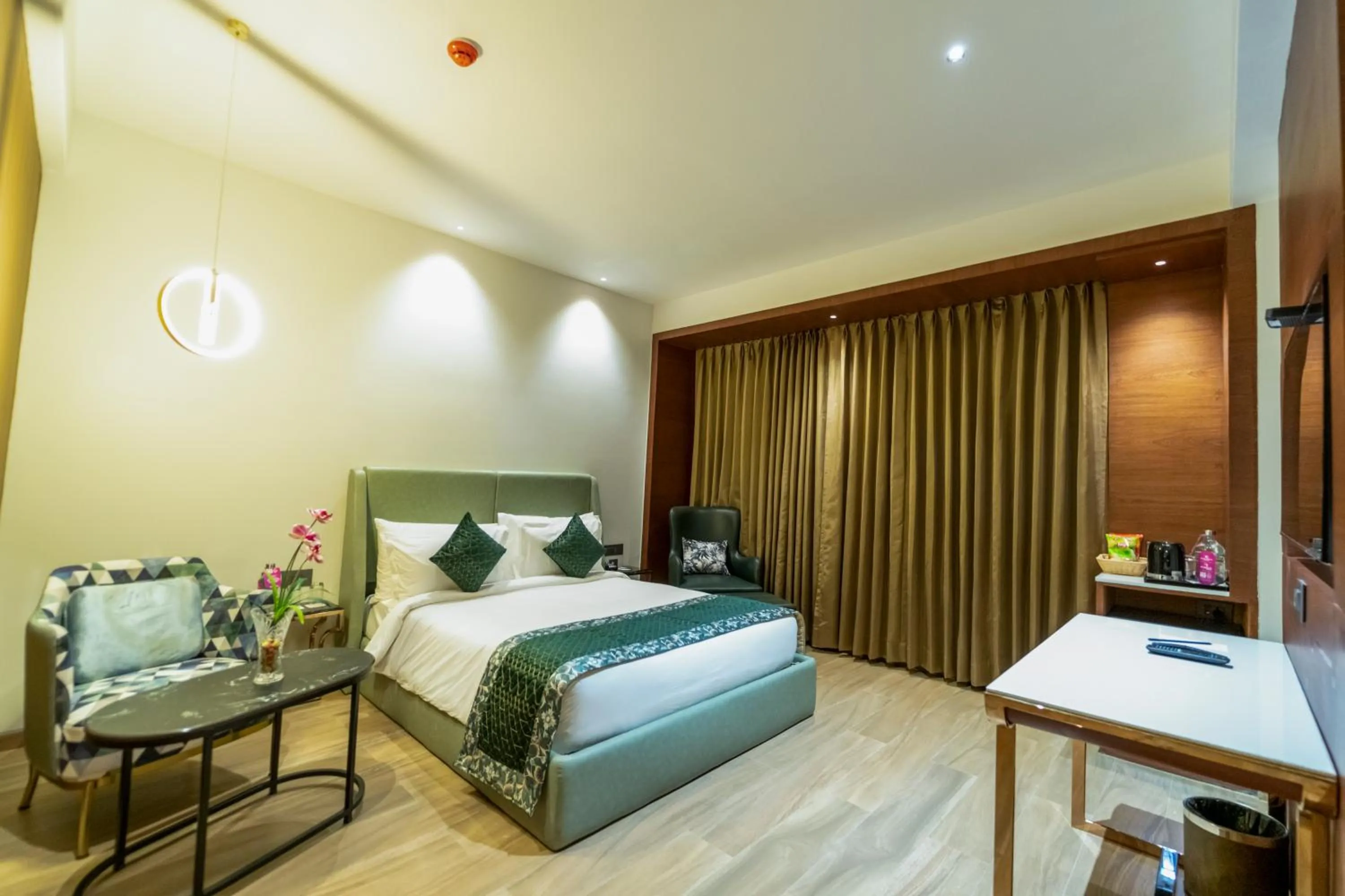Bed in Regenta Inn Bhavani Nellore By Royal Orchid Hotels