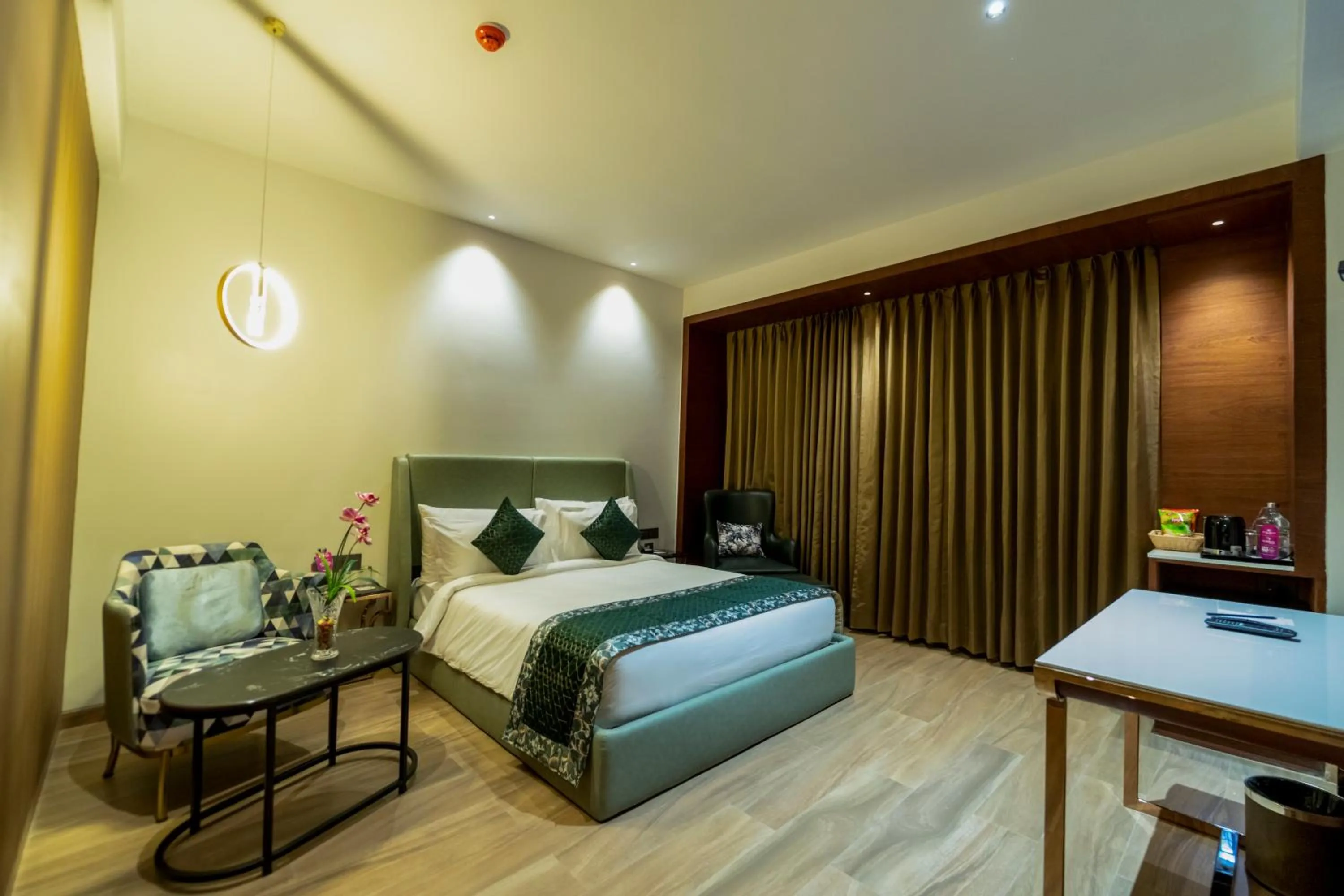 Photo of the whole room, Bed in Regenta Inn Bhavani Nellore By Royal Orchid Hotels