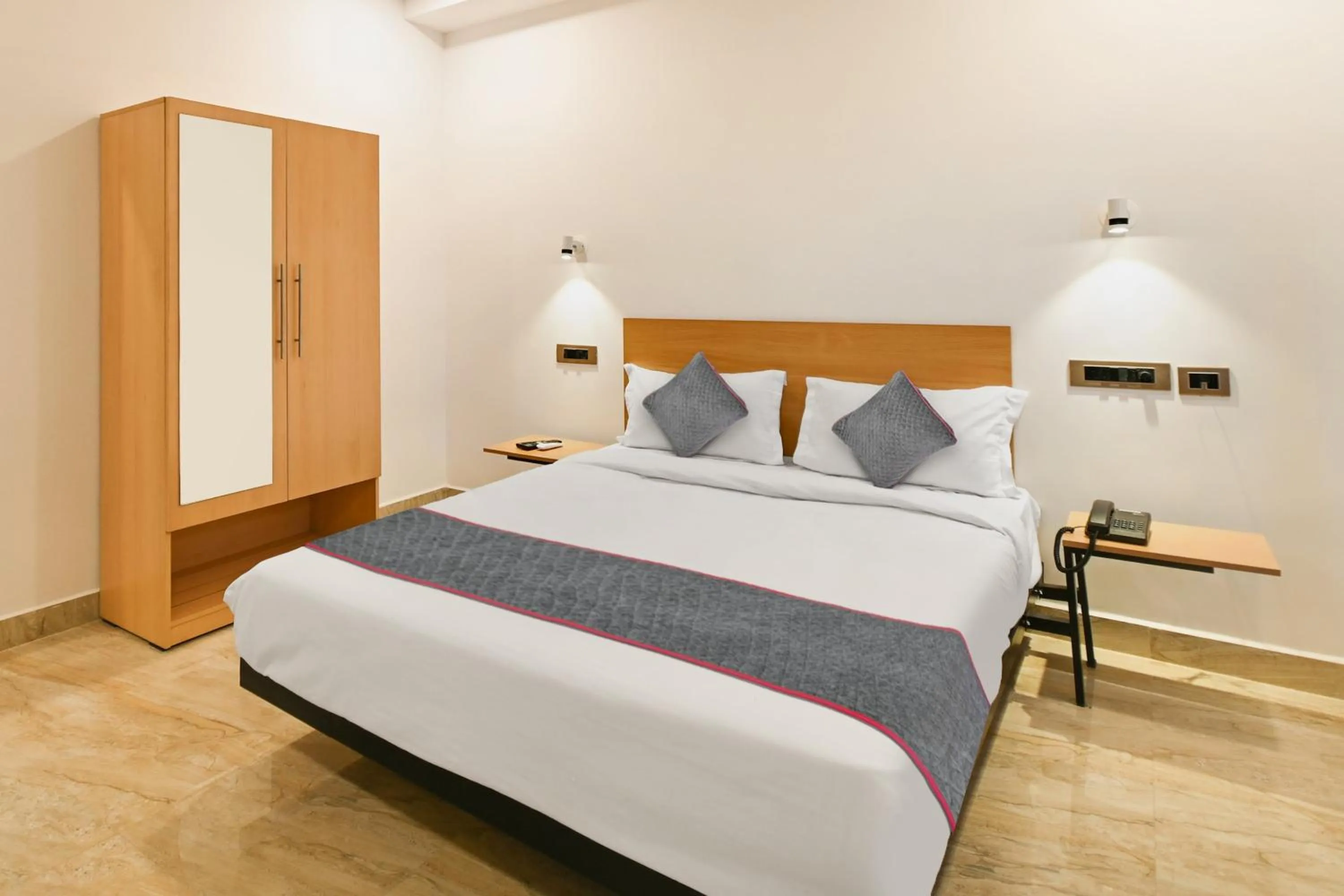 Bedroom in Super Townhouse De Alphabet Karmanghat