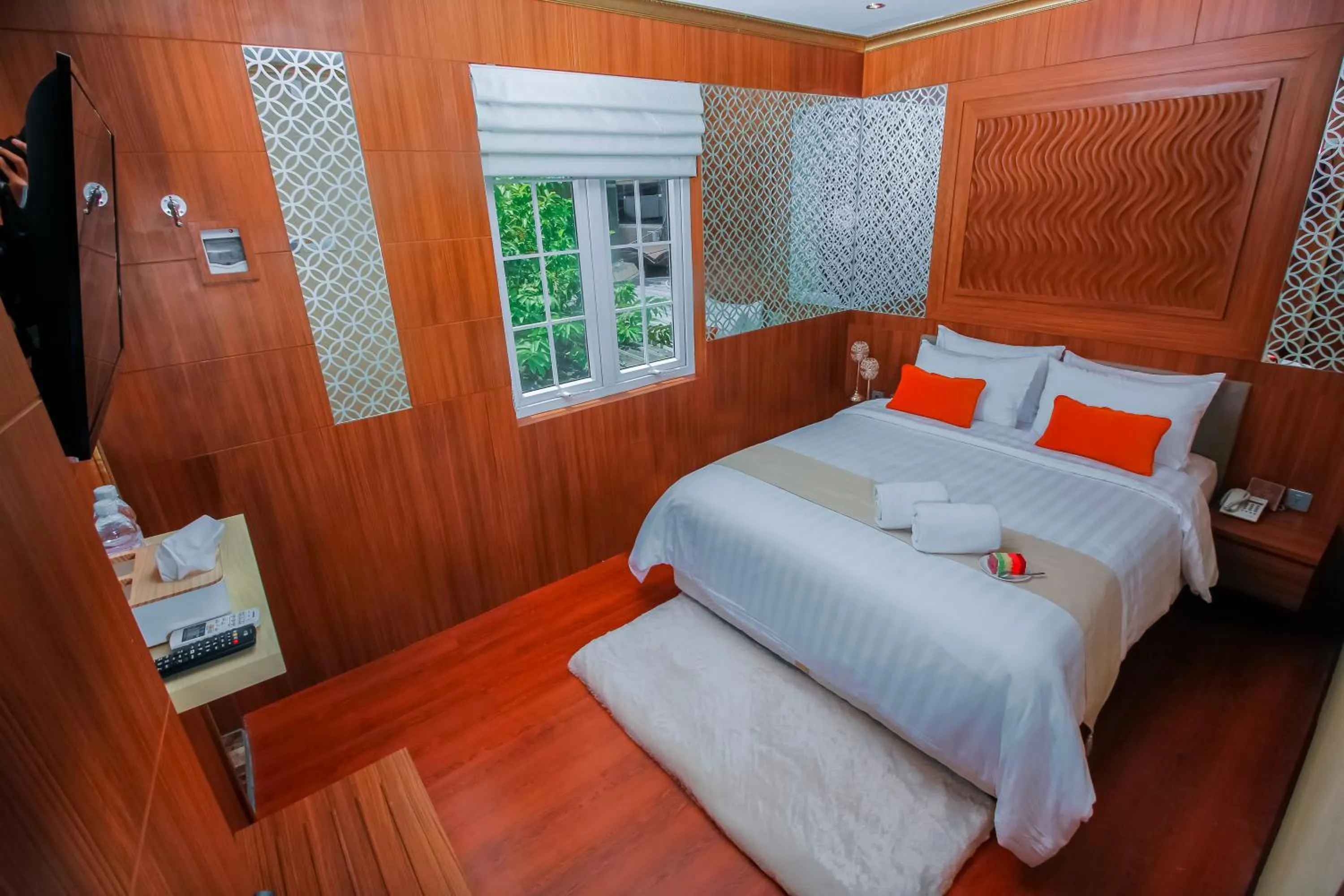 Bed in PETIT BOUTIQUE HOTEL SOLO