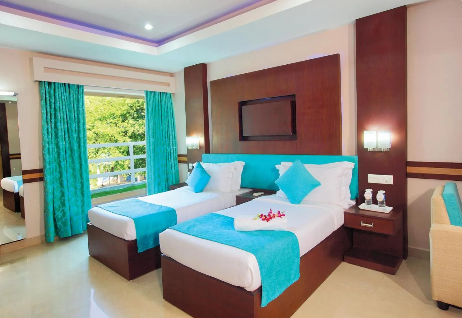 Bed in HOTEL SRIVATSA REGENCY