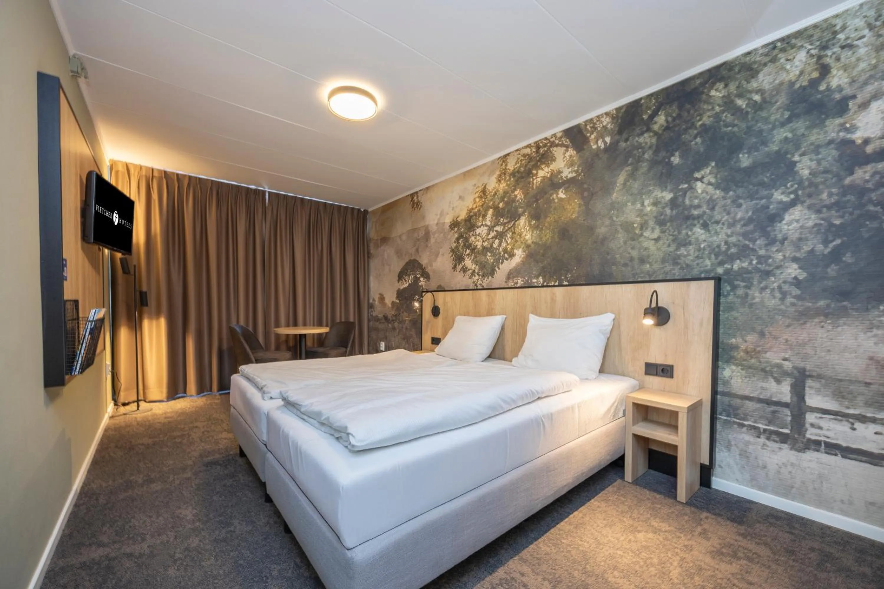 Photo of the whole room, Bed in Fletcher Hotel Restaurant Bon Repos