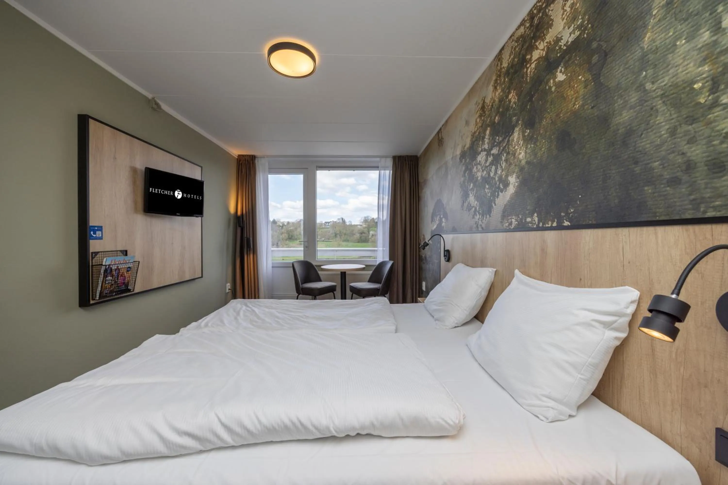 Photo of the whole room, Bed in Fletcher Hotel Restaurant Bon Repos