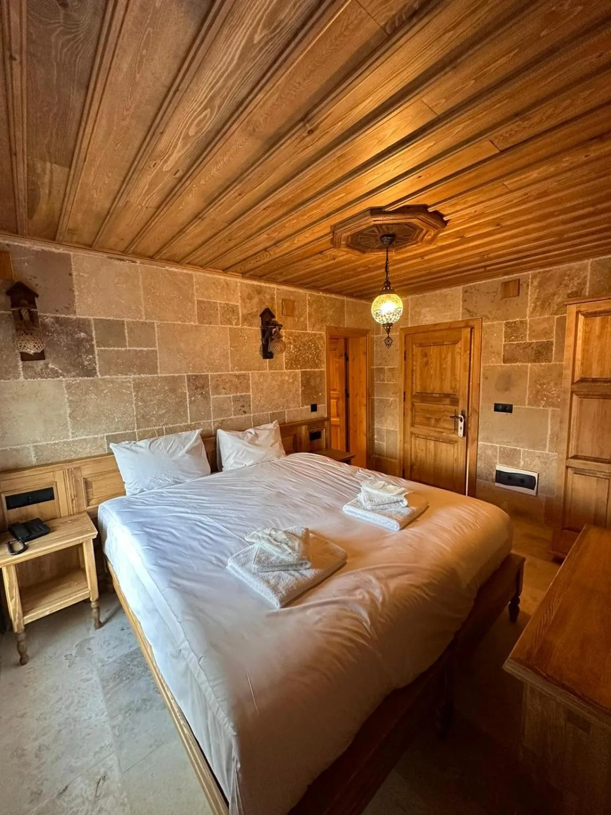 Bed in ELEVRES STONE HOUSE HOTEL