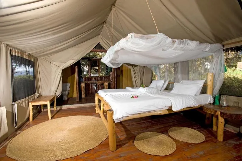 Bed in Migunga Tented Camp