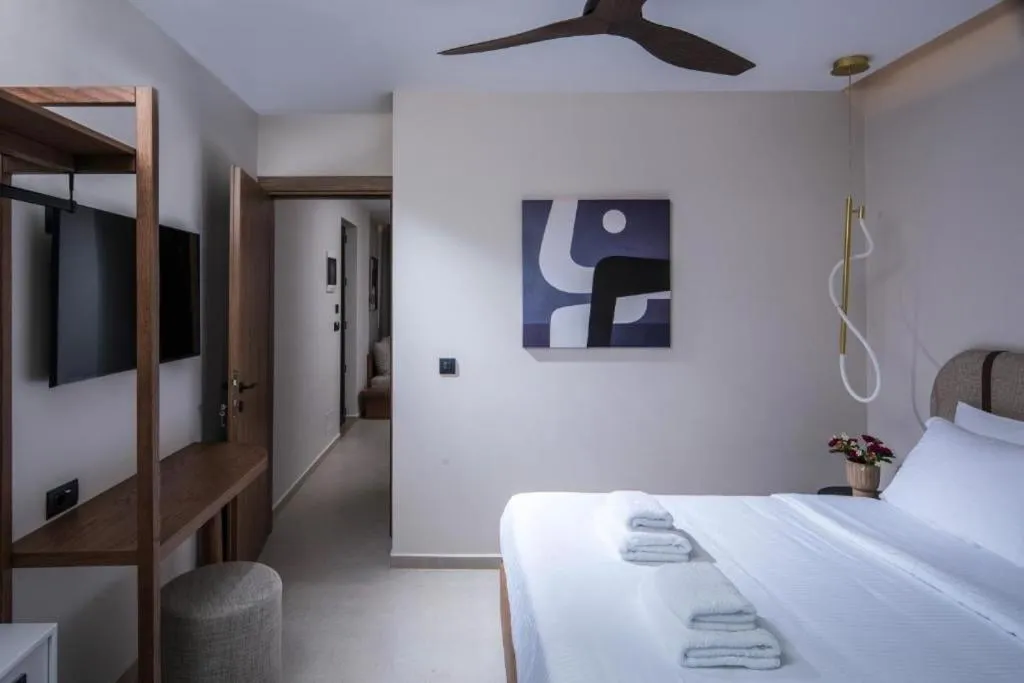 Bed in VAYA Suites by Omilos Hotels