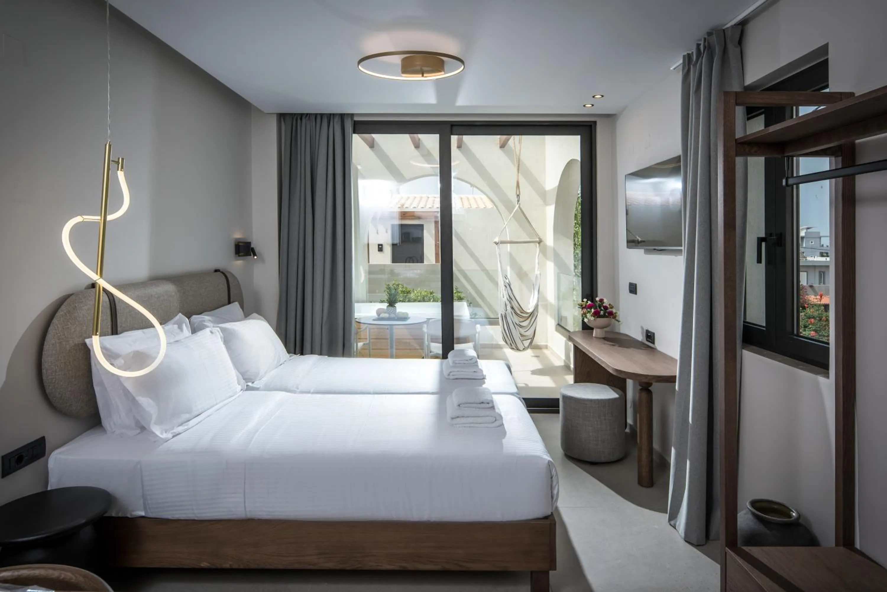 TV and multimedia, Bed in VAYA Suites by Omilos Hotels