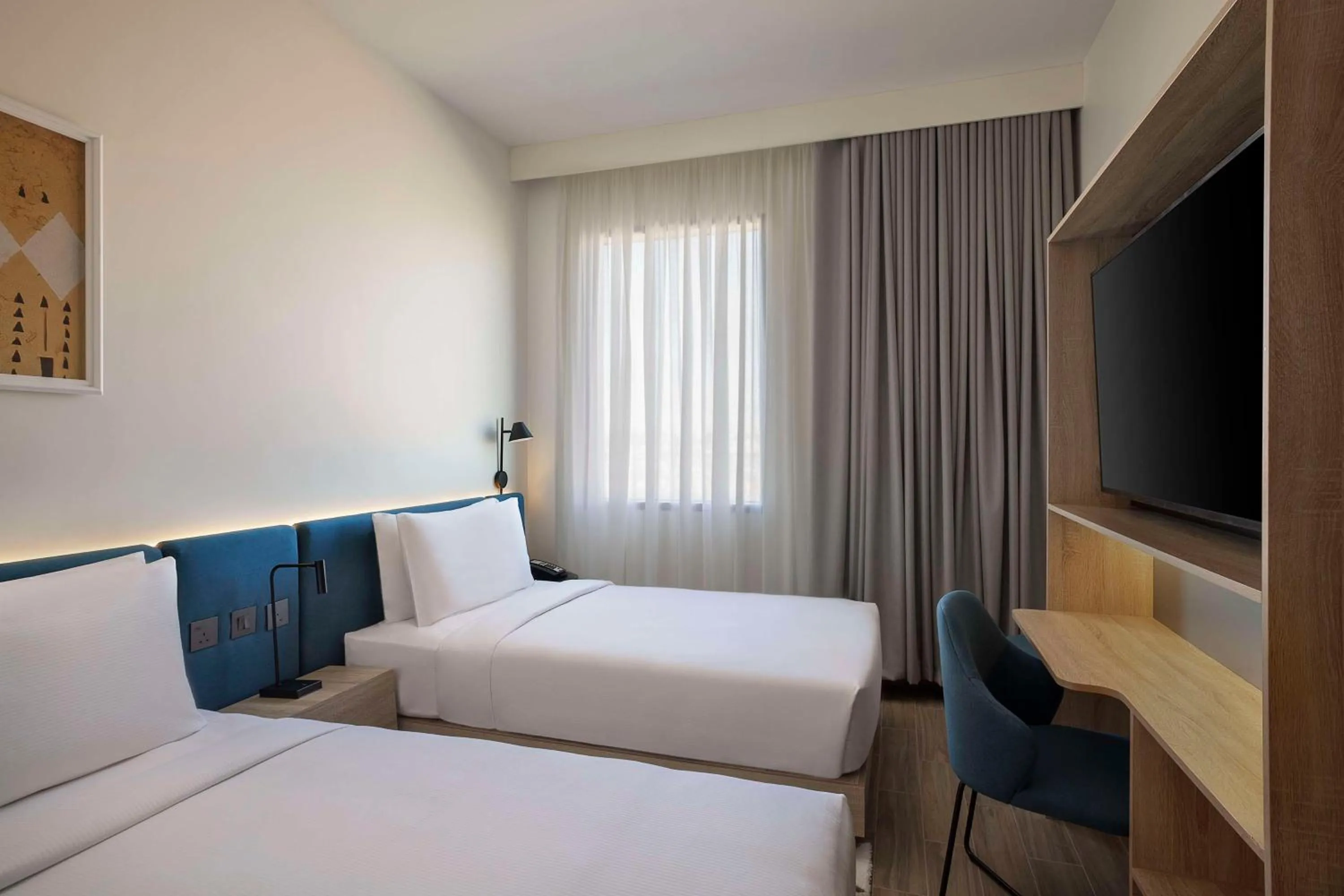 Bedroom, Bed in Hampton by Hilton Sharma NEOM Community 1