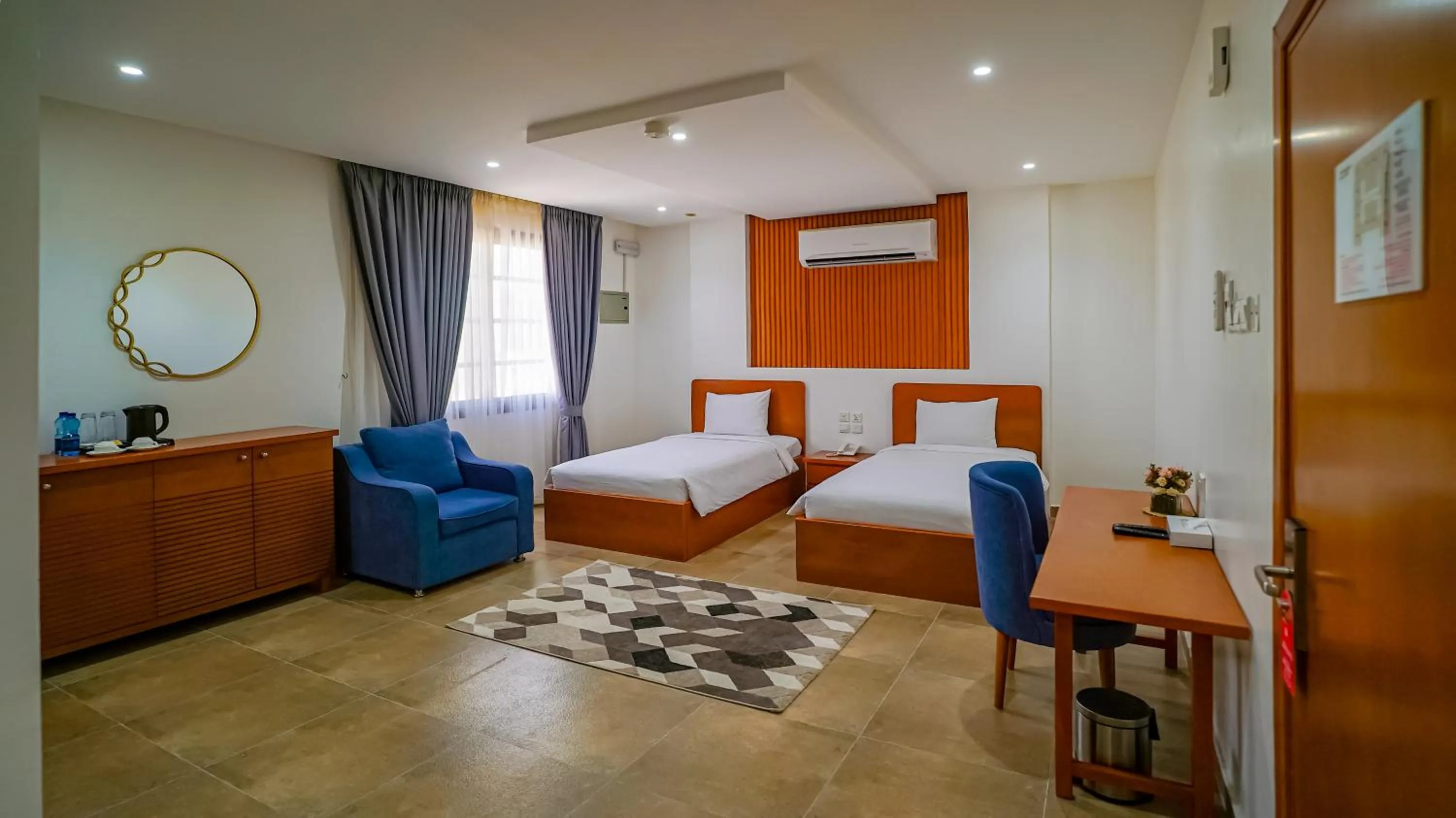 Living room, Bed in Express City Hotel - Duqm