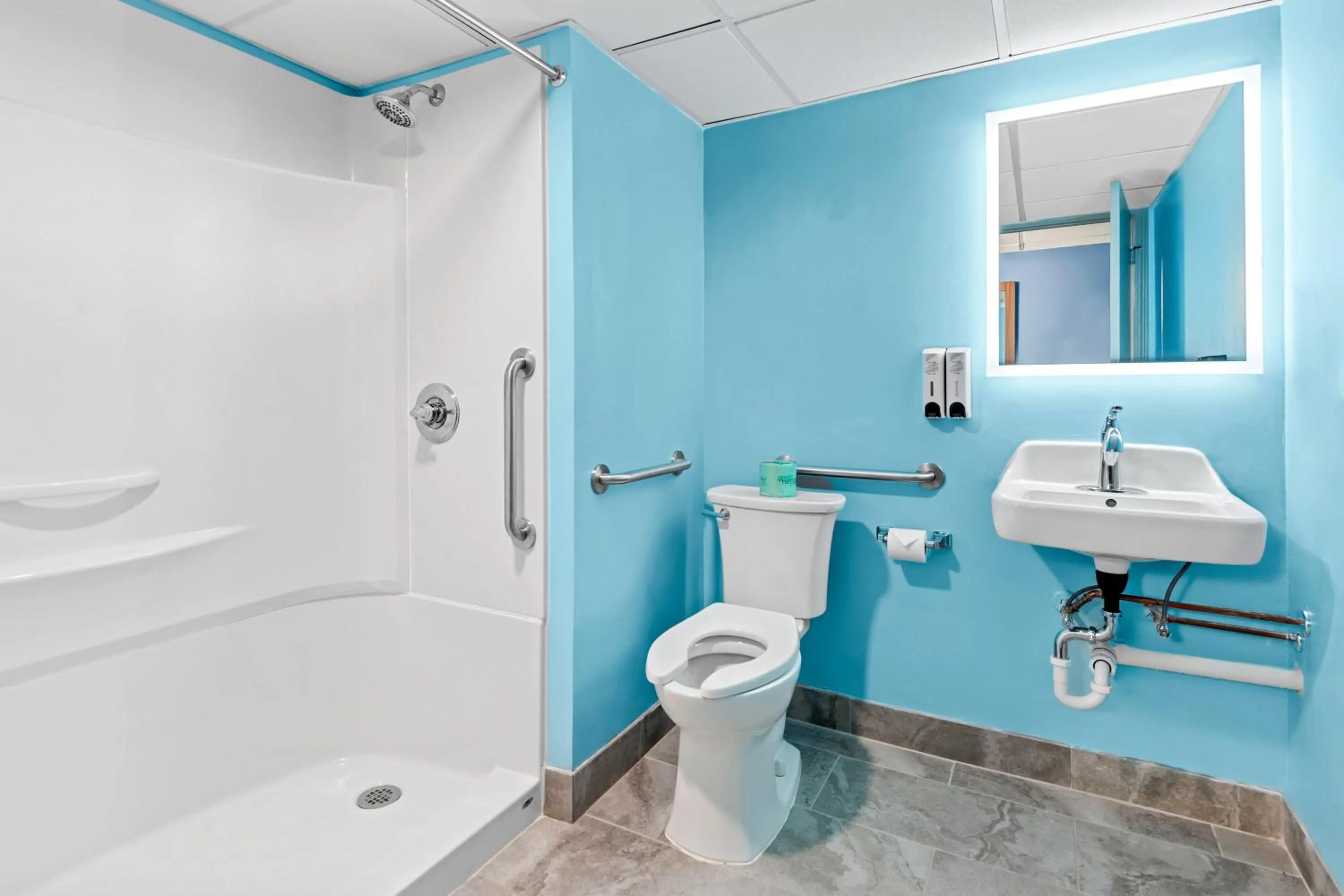 Bathroom in Ramada Conference Center by Wyndham Cortland