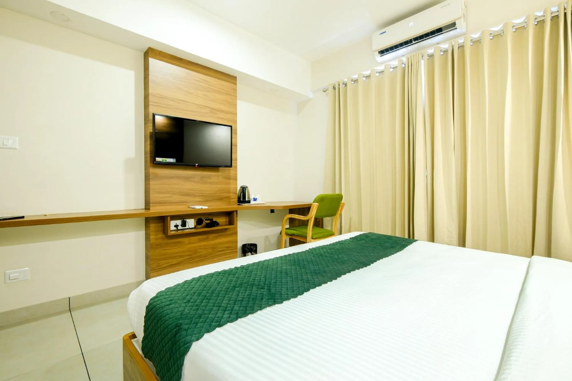 Bed in The Heartland Business Hotel