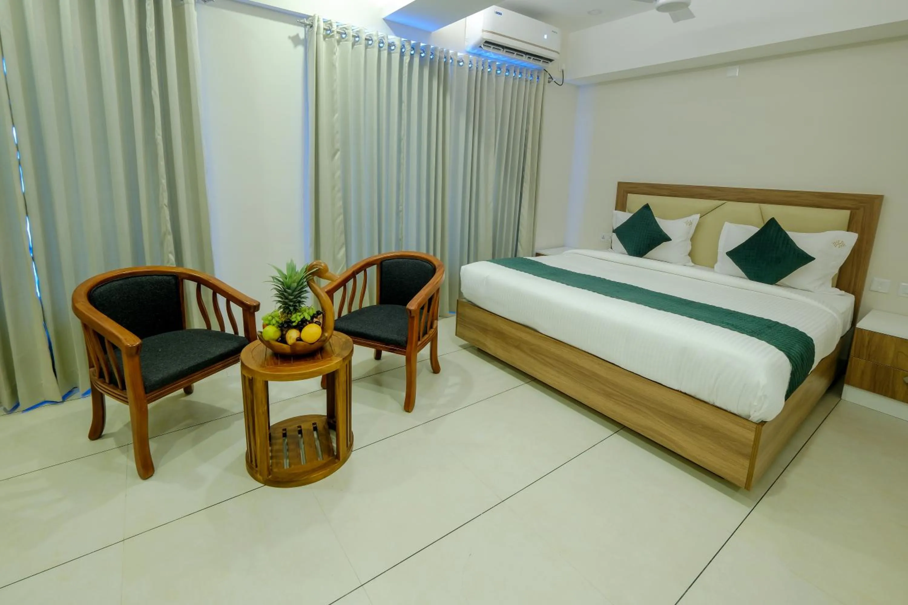 Bed in The Heartland Business Hotel