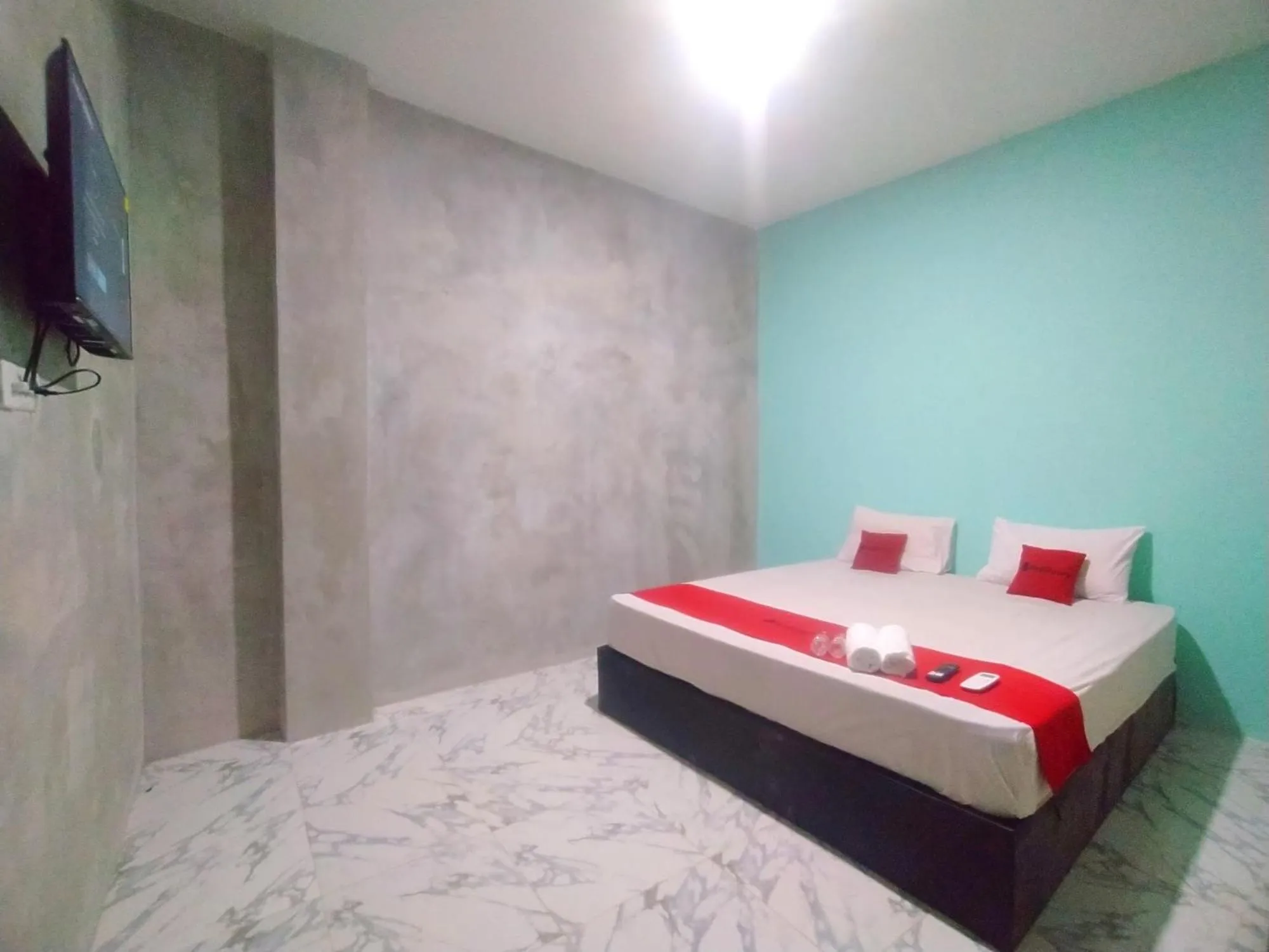 Bed in RedDoorz Syariah near Exit Tol Bojong Pekalongan