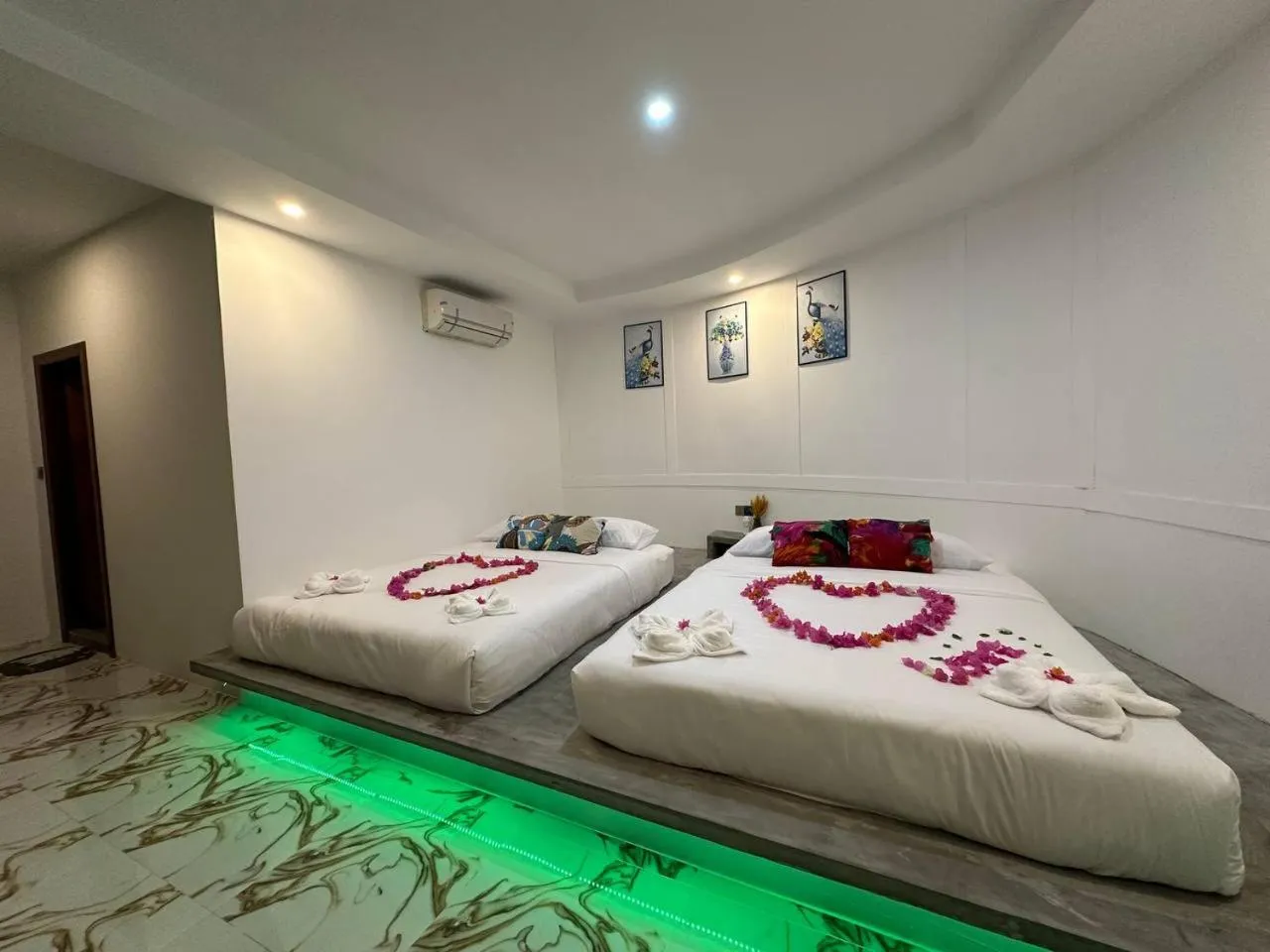 Bed in SEA SAND RESORT