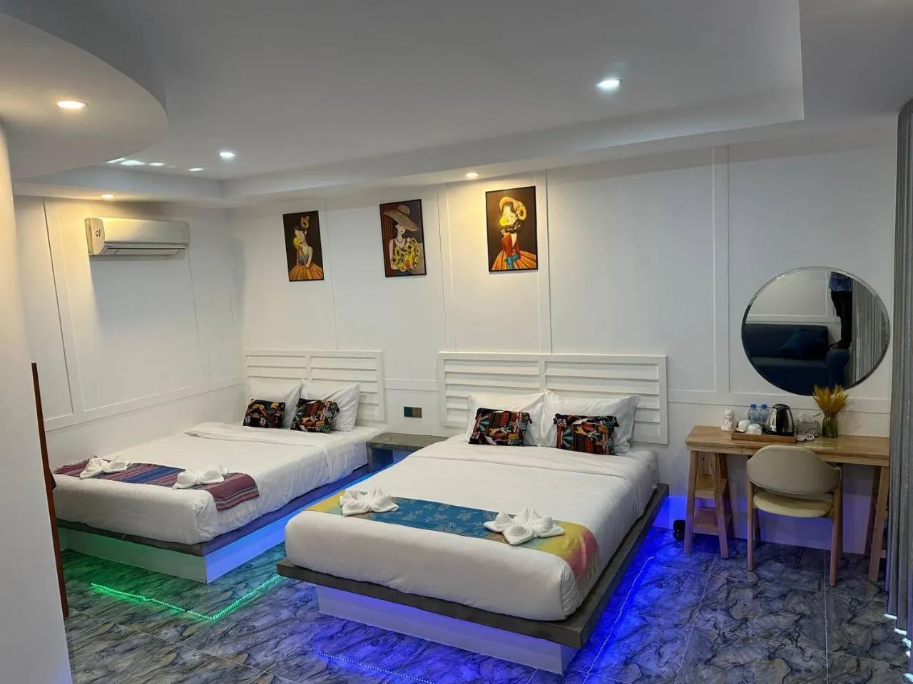 Bed in SEA SAND RESORT