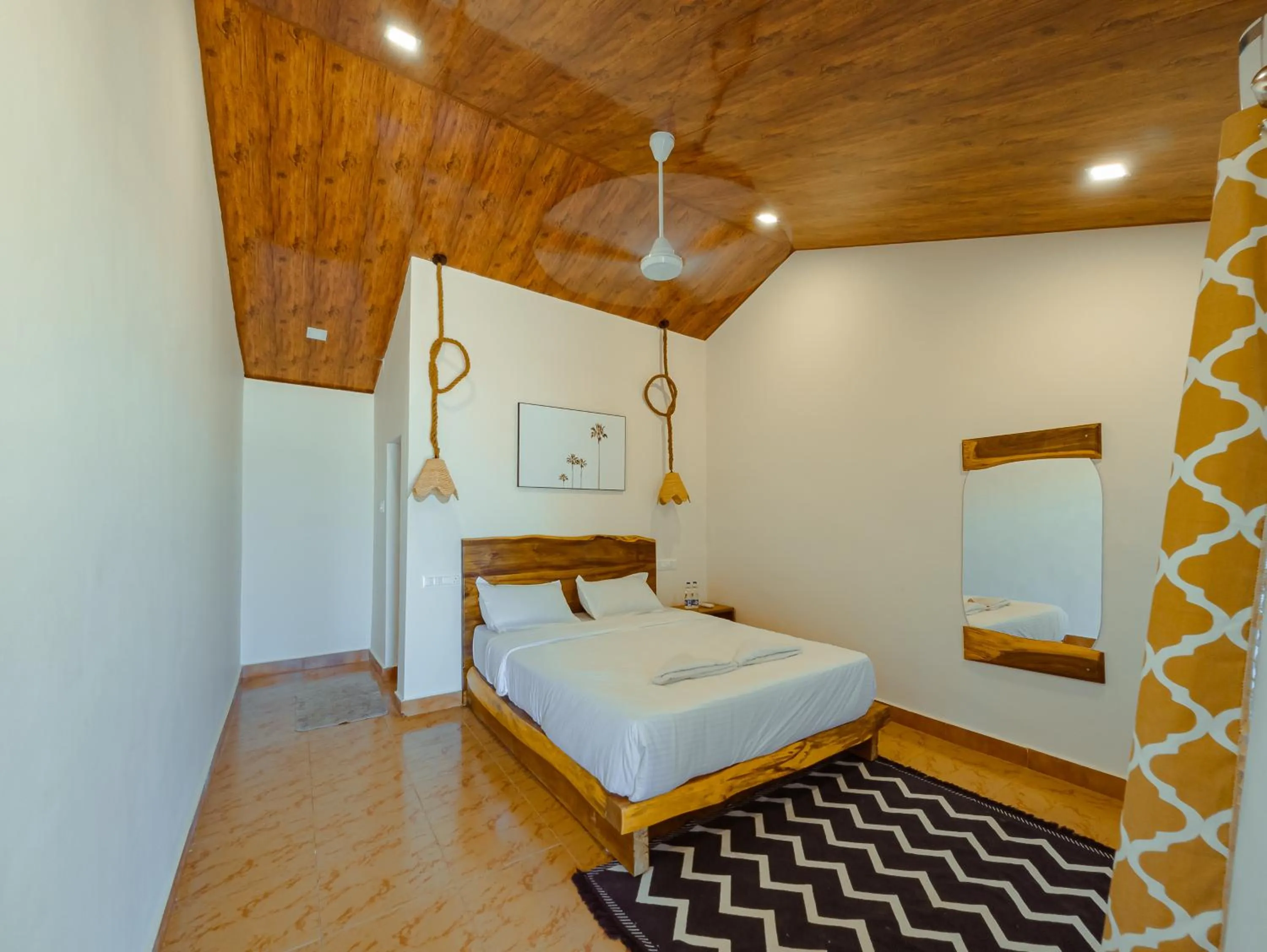 Bed in Sunset Cafe Beach Stay