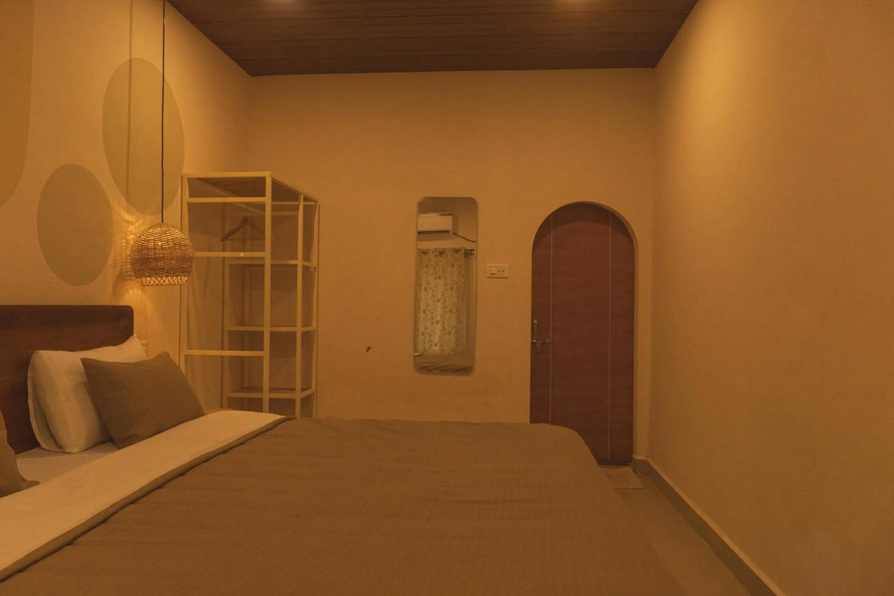 Bed in Sunset Cafe Beach Stay