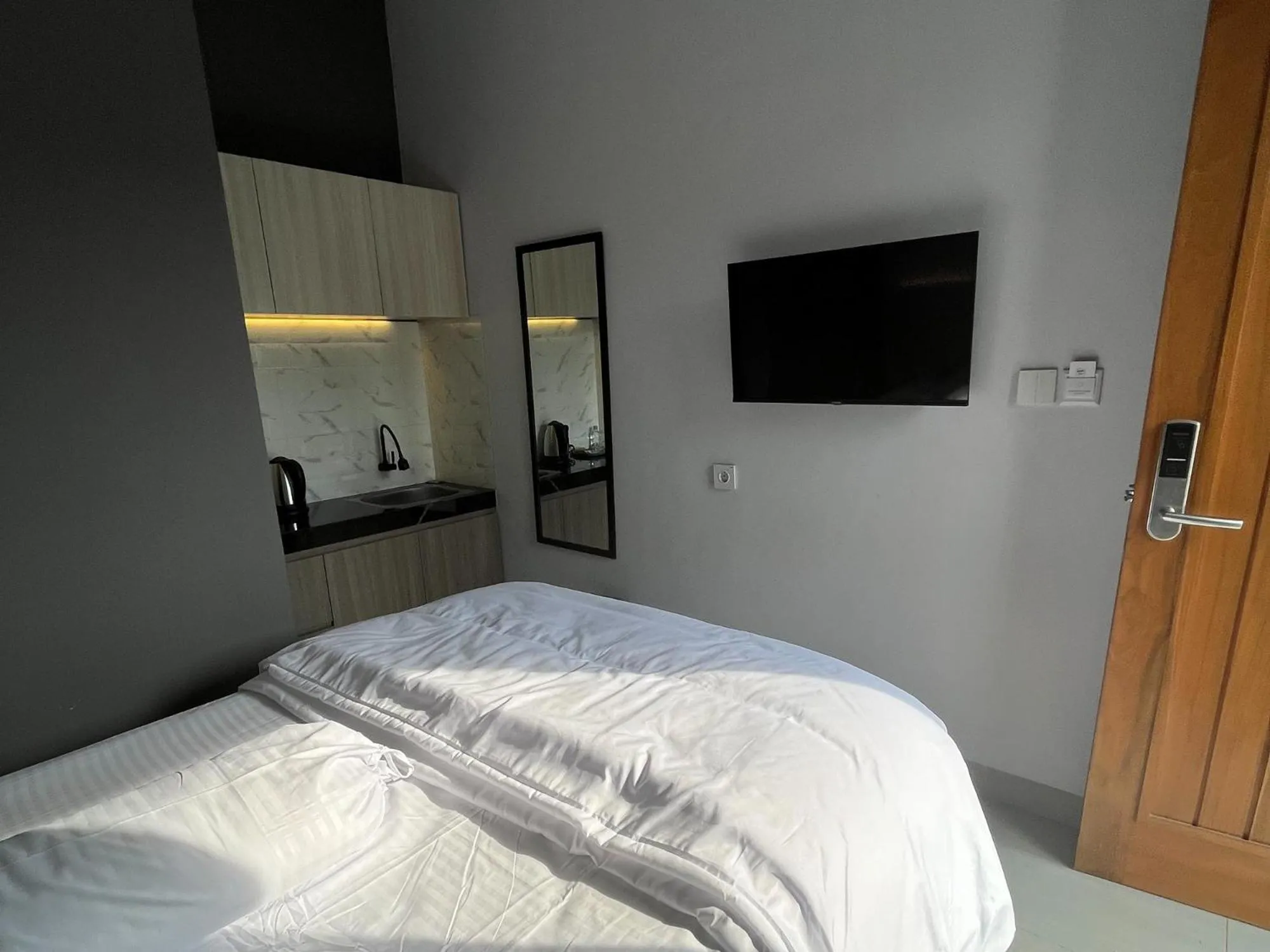 Bed in Kaira Room Guest House Syariah Mitra RedDoorz