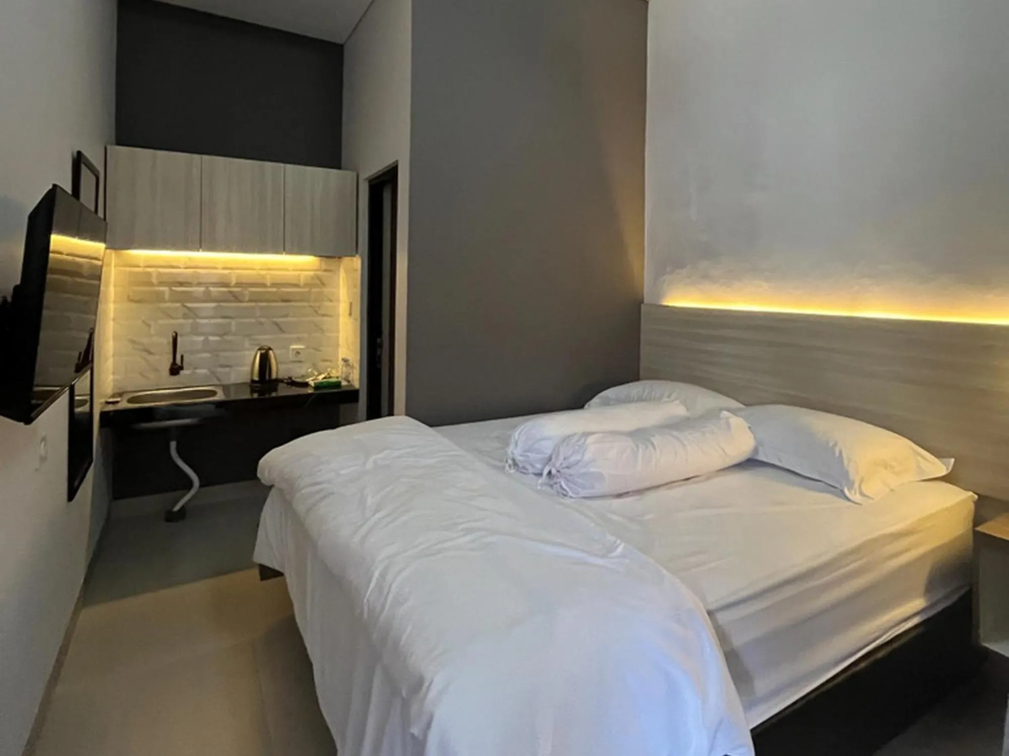 Bed in Kaira Room Guest House Syariah Mitra RedDoorz