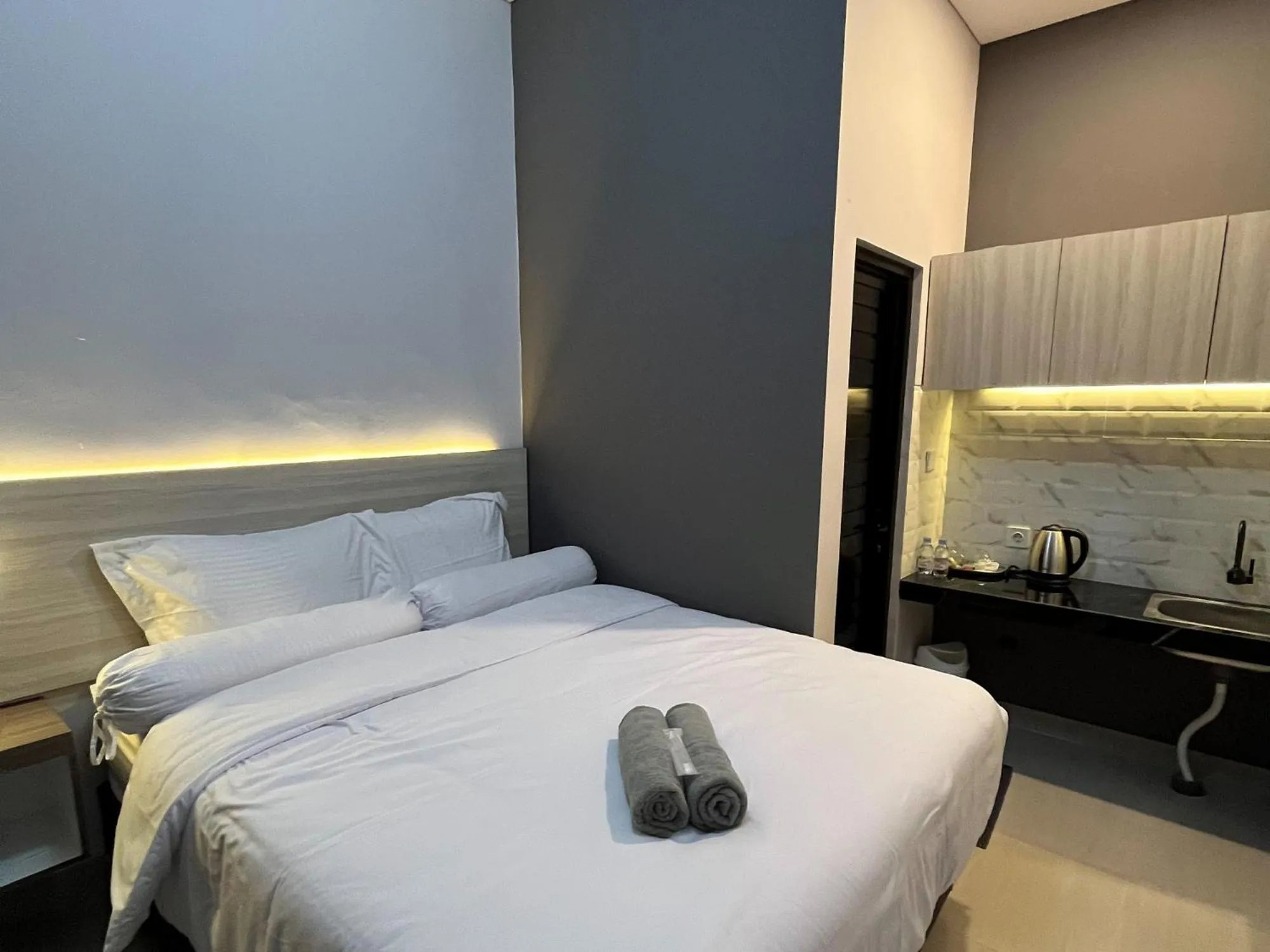 Bed in Kaira Room Guest House Syariah Mitra RedDoorz