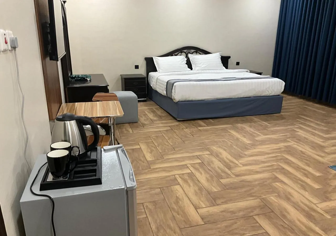 Photo of the whole room, Bed in Al Baida Suites Al Salam Branch
