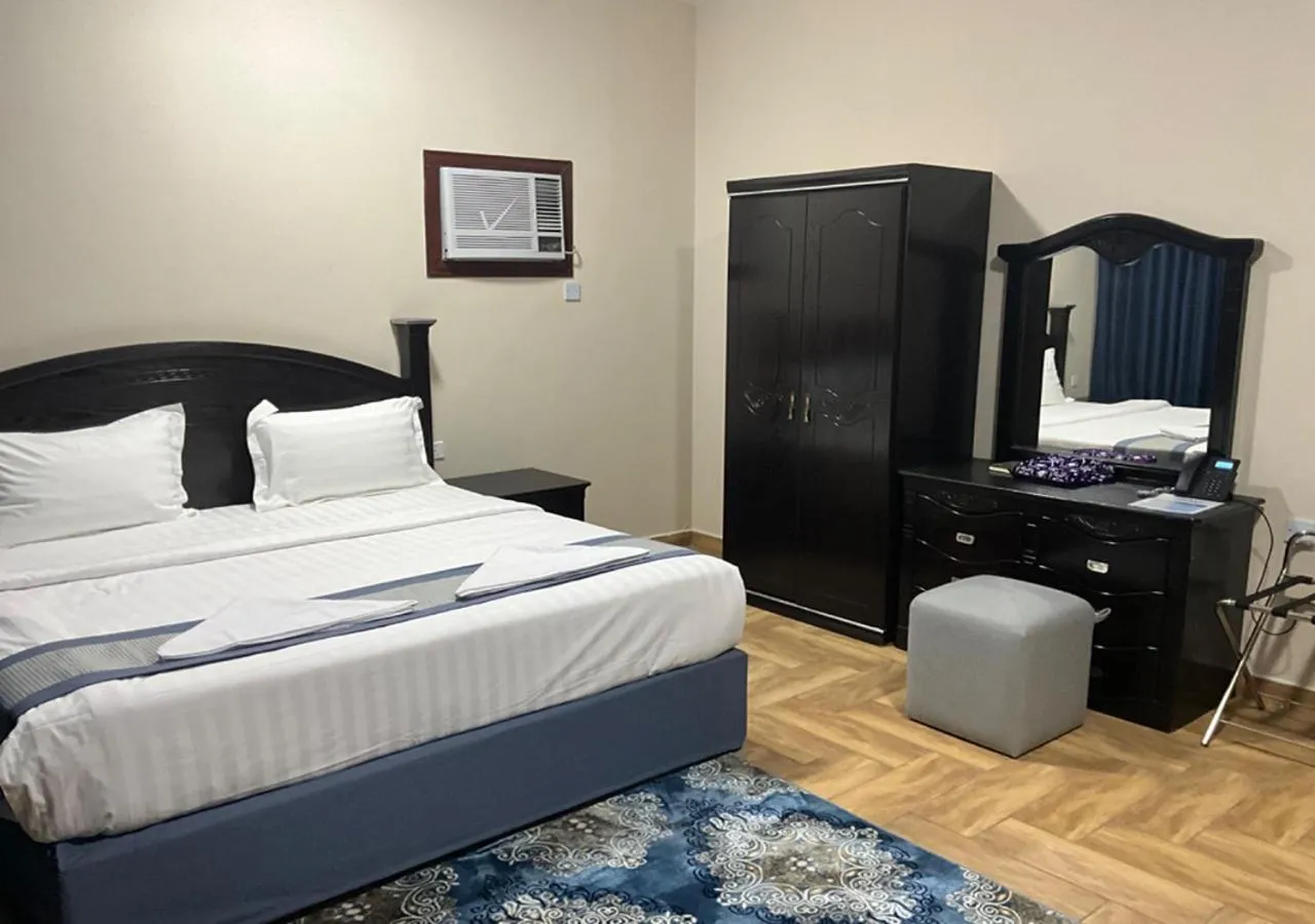 Photo of the whole room, Bed in Al Baida Suites Al Salam Branch