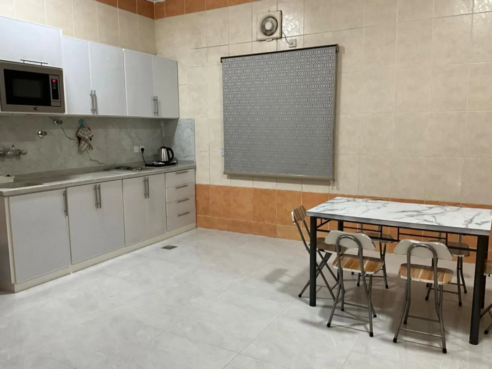 Kitchen or kitchenette in Al Baida Suites Al Salam Branch