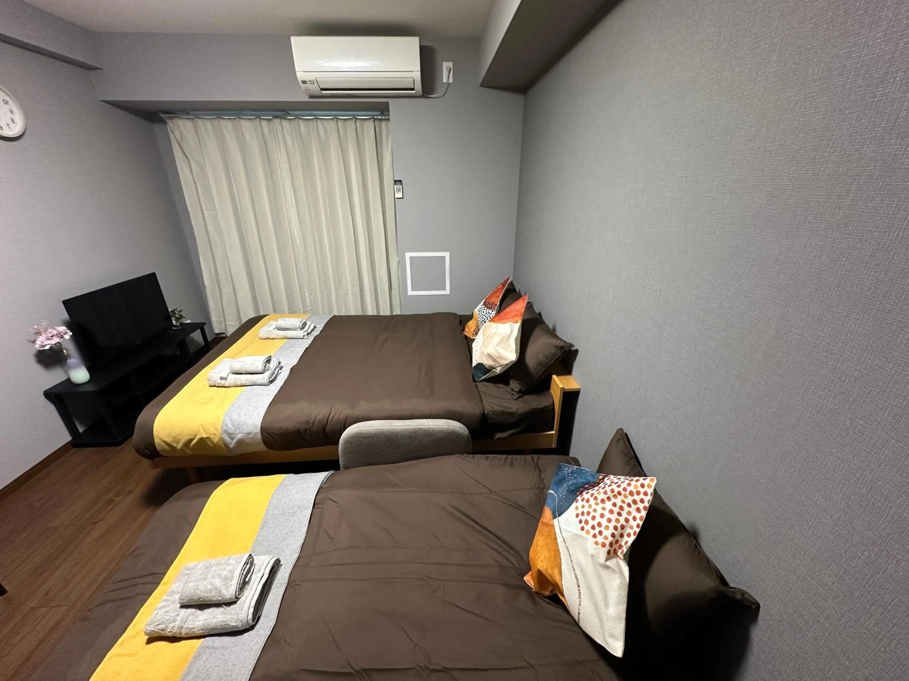 Bed in nestay apartment osaka ebisu