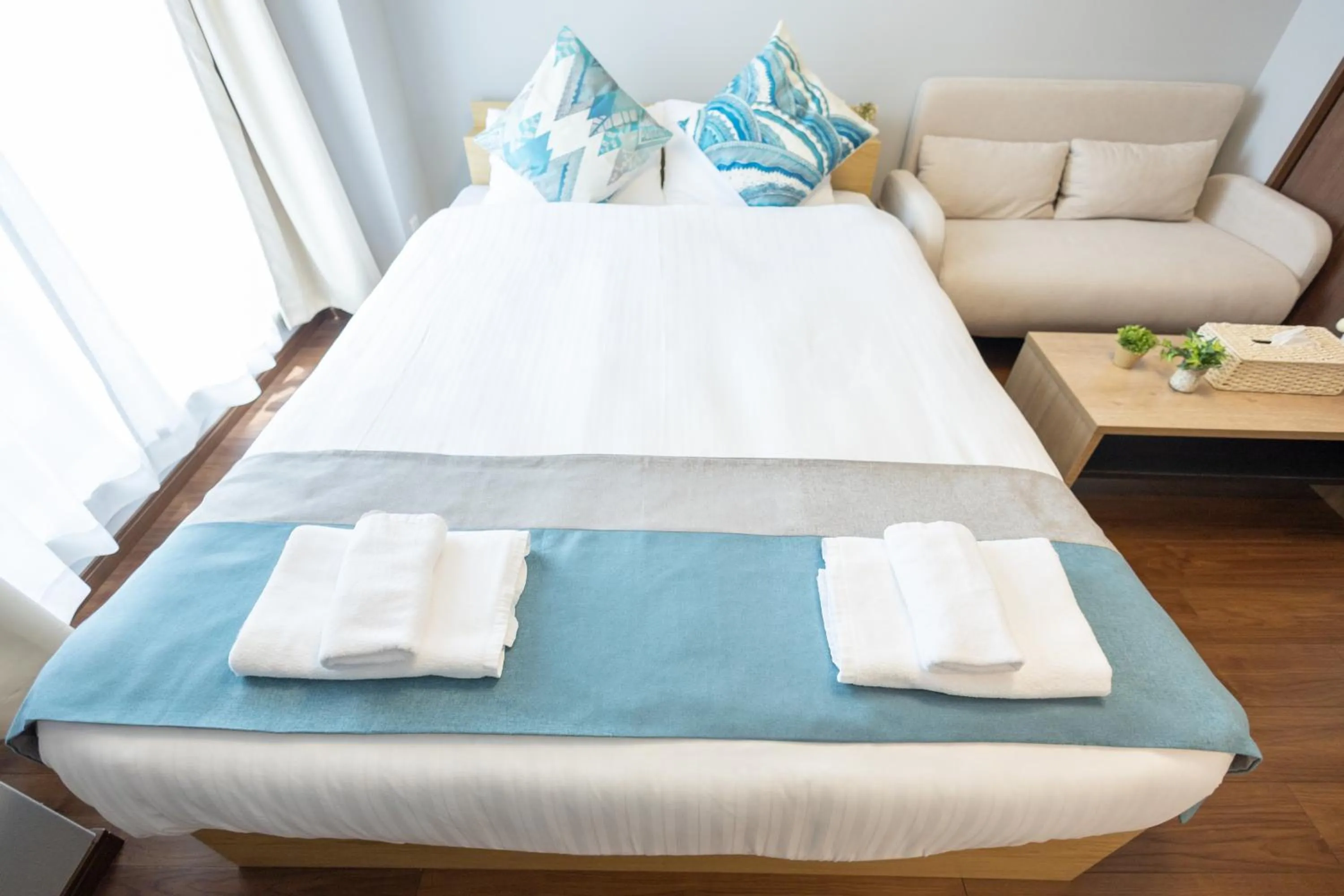 Bed in nestay apartment osaka ebisu