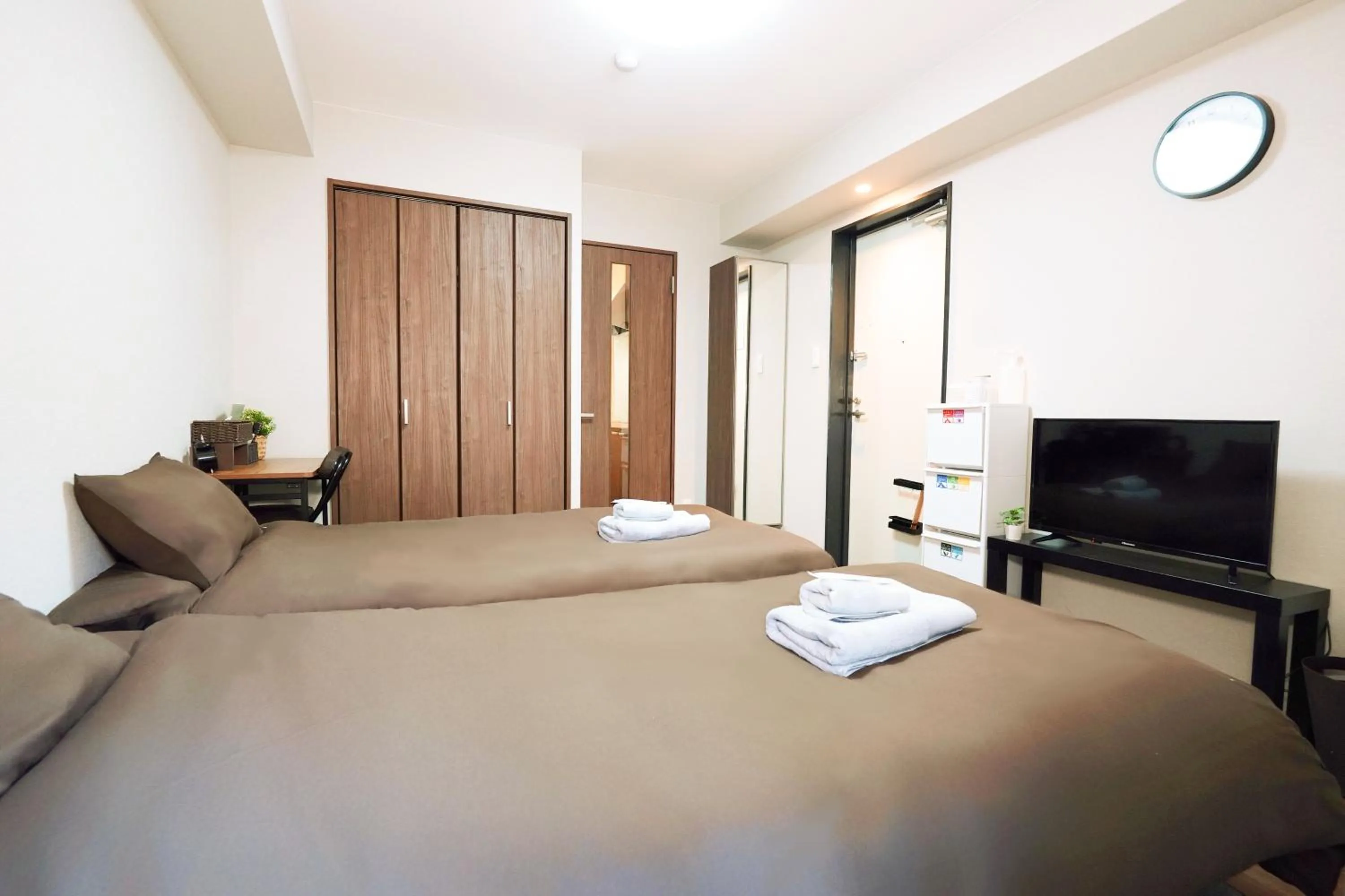 Bed in nestay apartment osaka ebisu