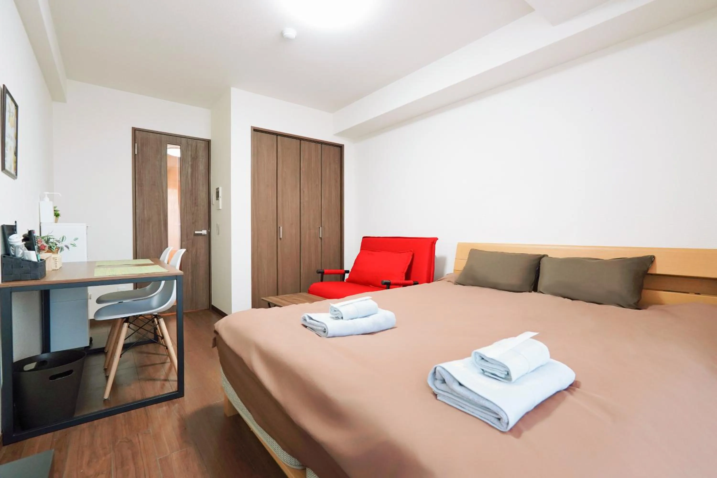 Bed in nestay apartment osaka ebisu