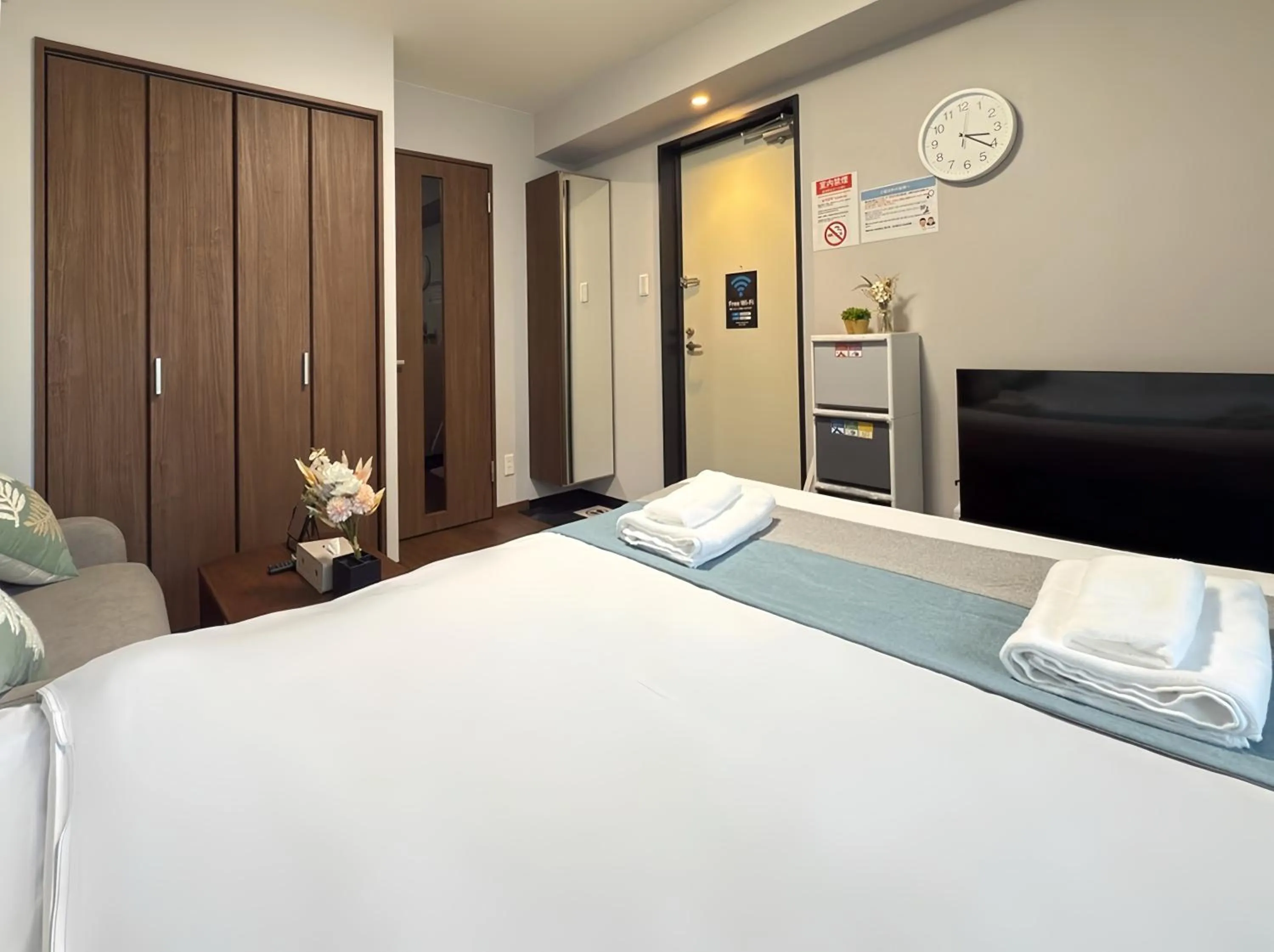 Bed in nestay apartment osaka ebisu