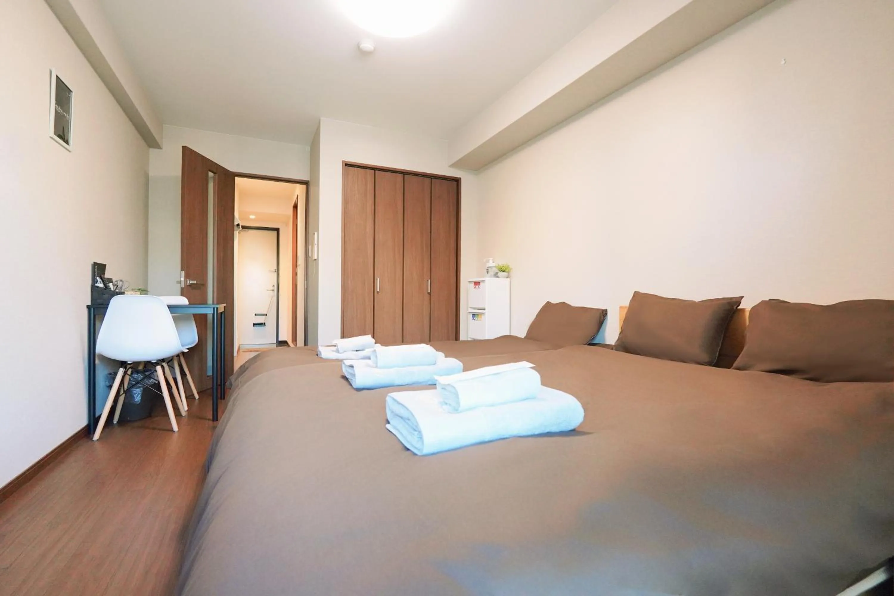 Bed in nestay apartment osaka ebisu