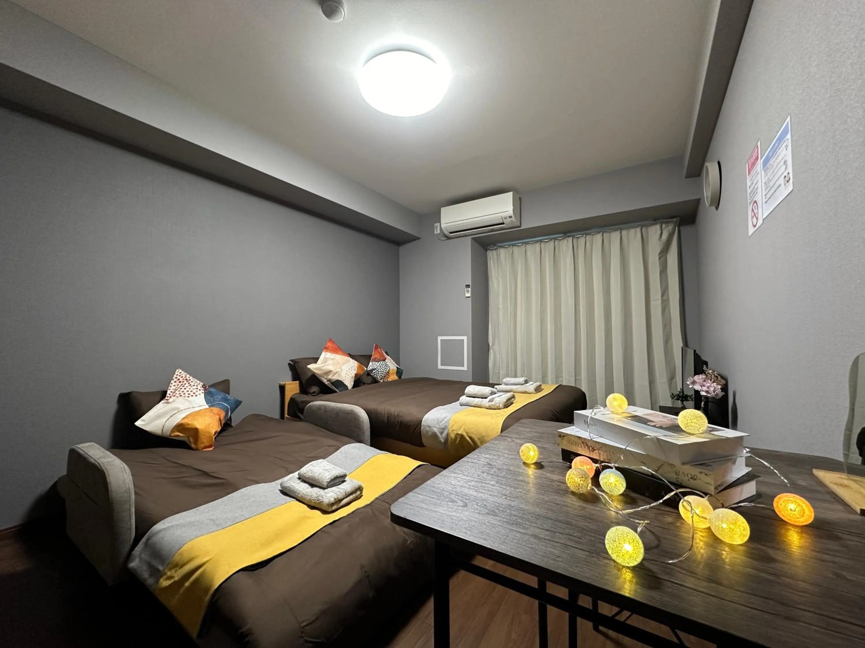 Bed in nestay apartment osaka ebisu