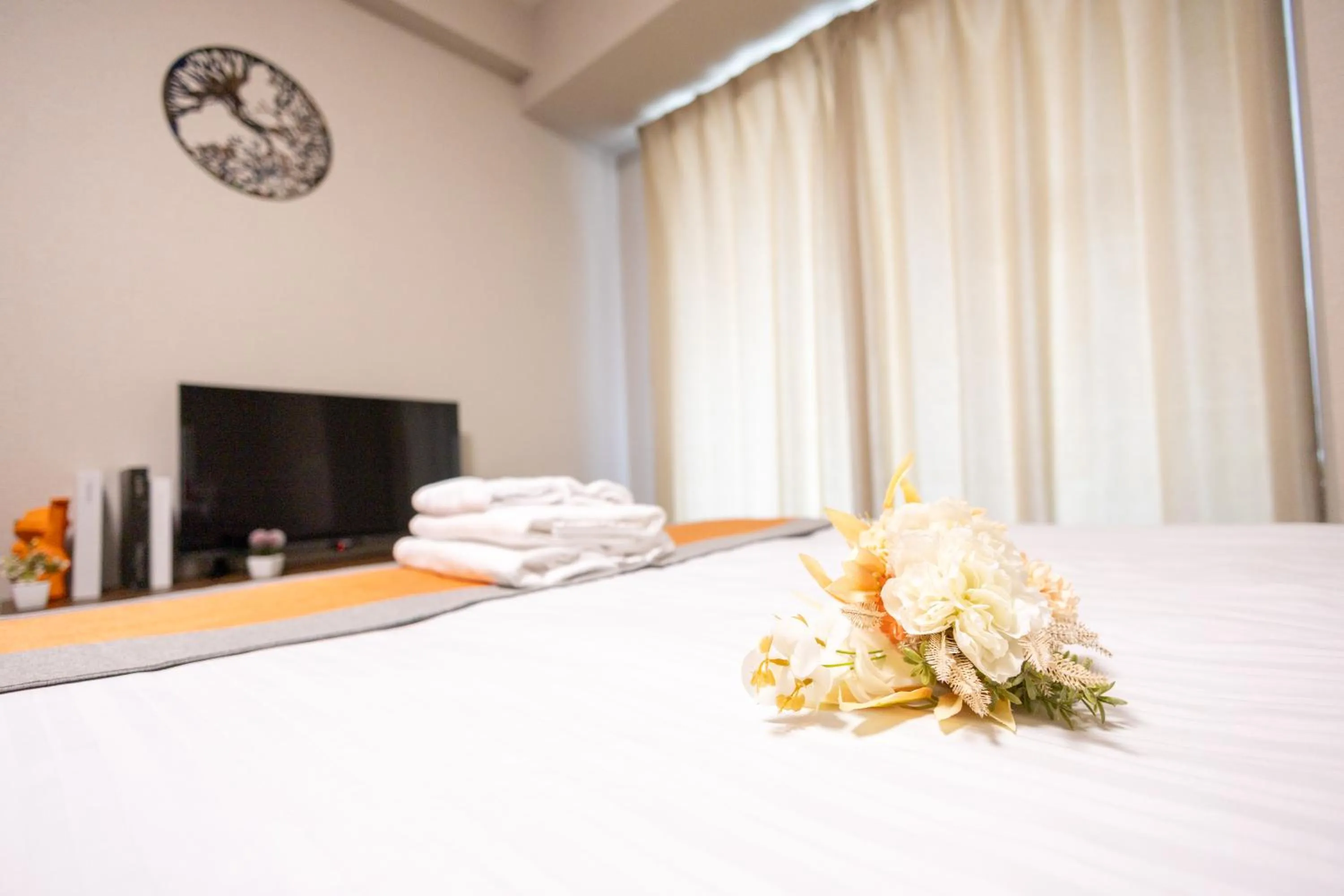 Bed in nestay apartment osaka ebisu