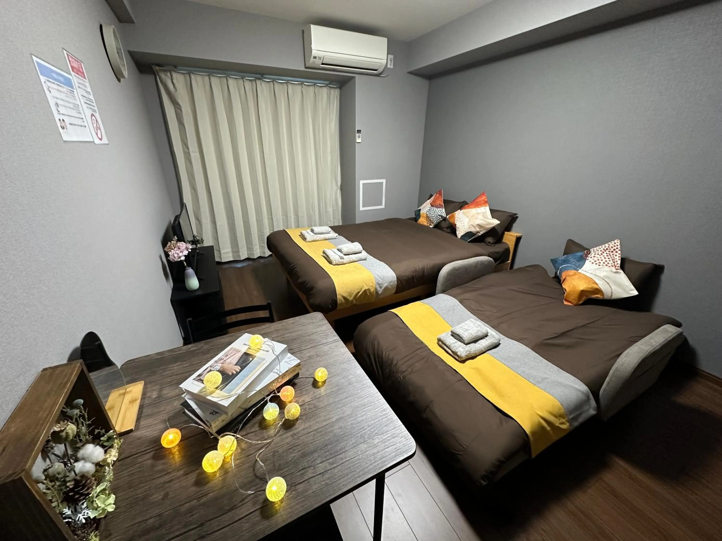 Bed in nestay apartment osaka ebisu