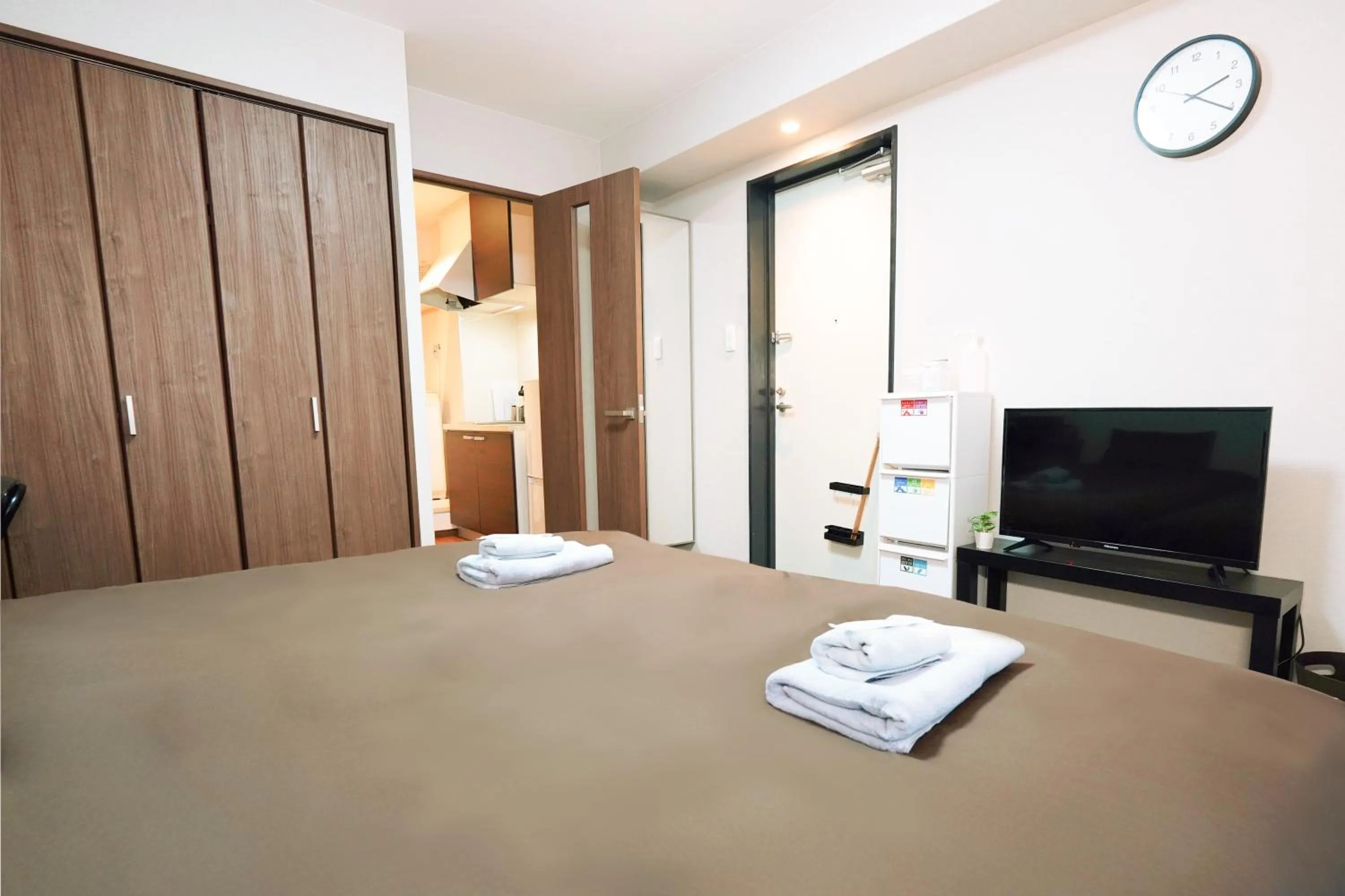 Bed in nestay apartment osaka ebisu