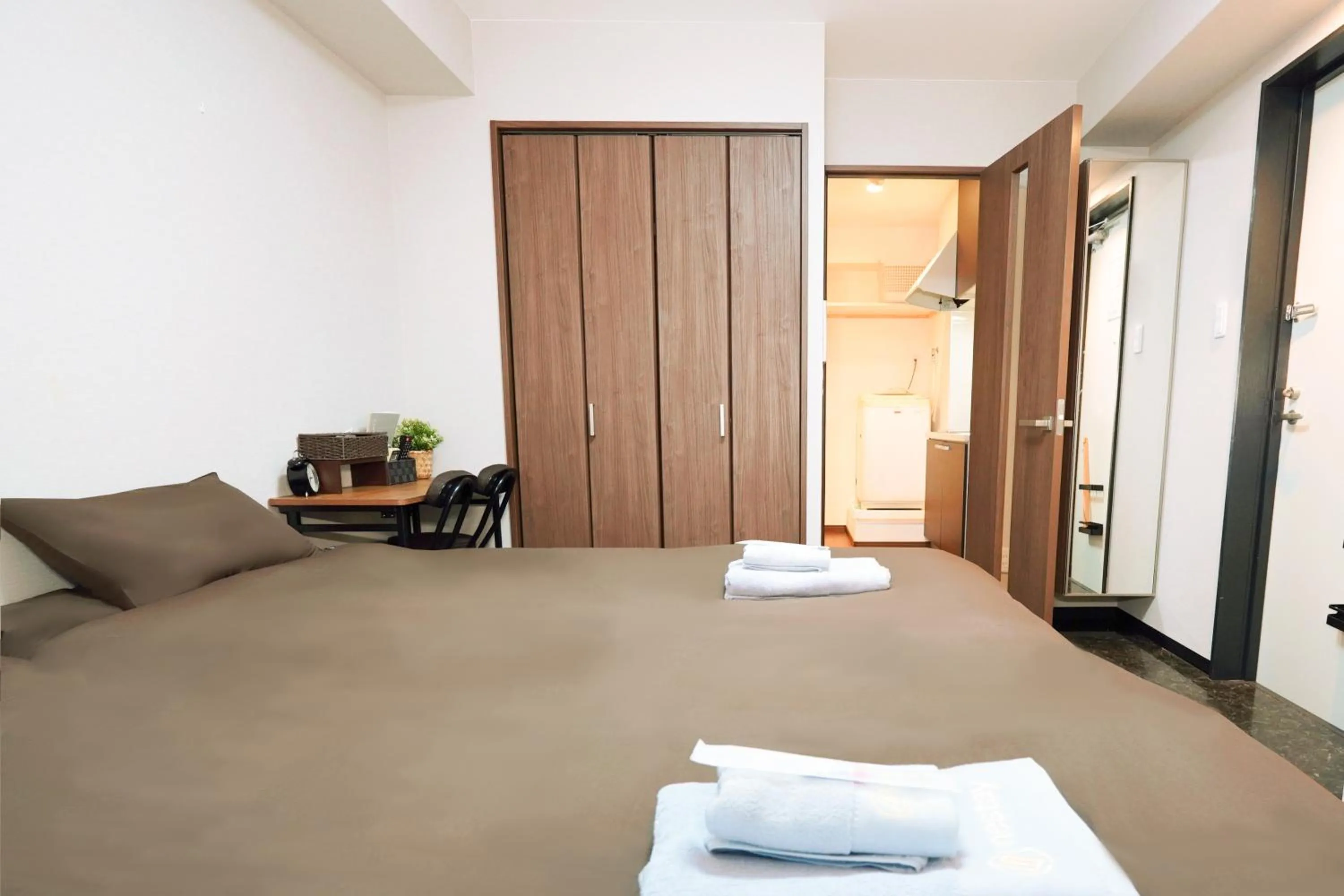 Bed in nestay apartment osaka ebisu