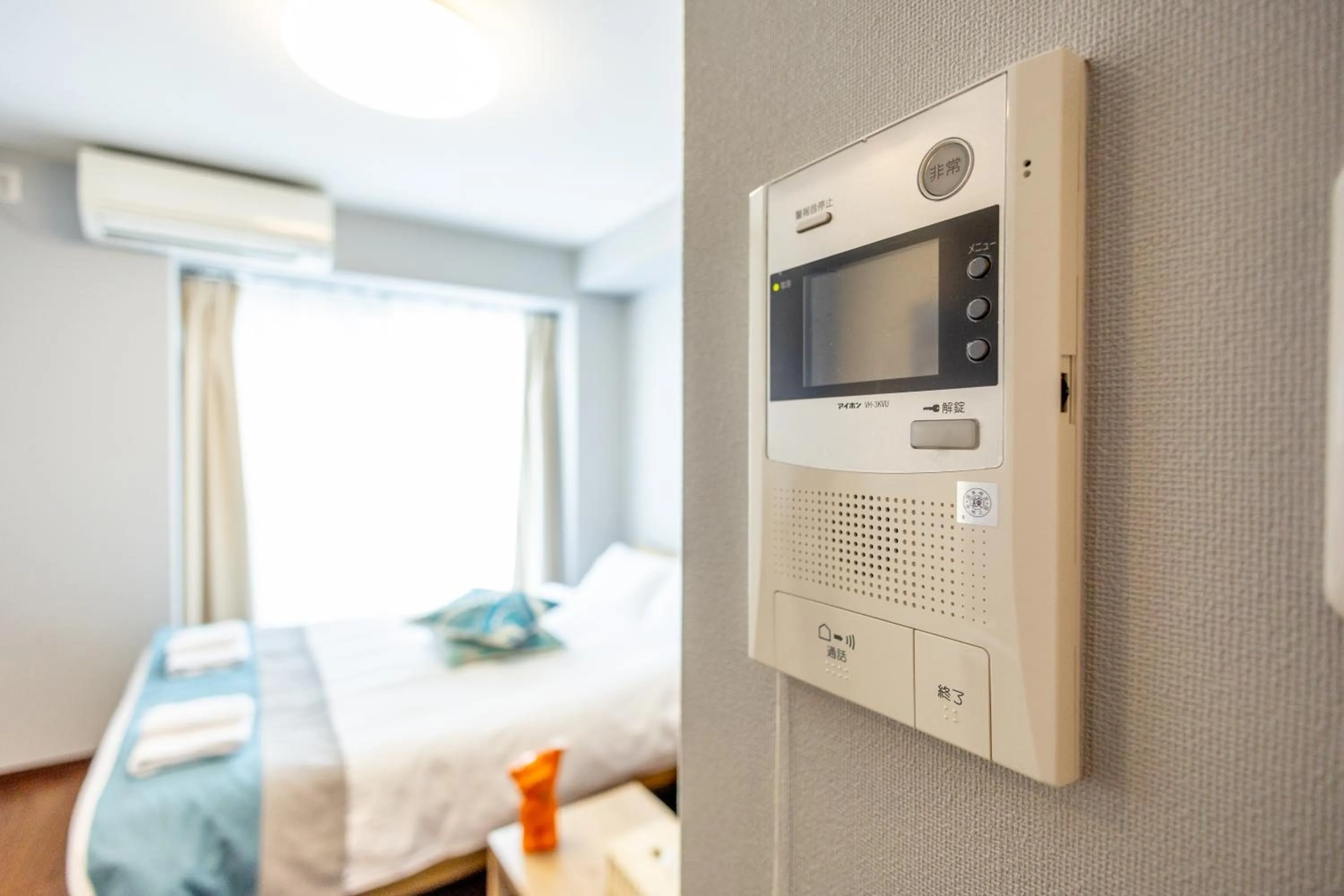 Bed in nestay apartment osaka ebisu