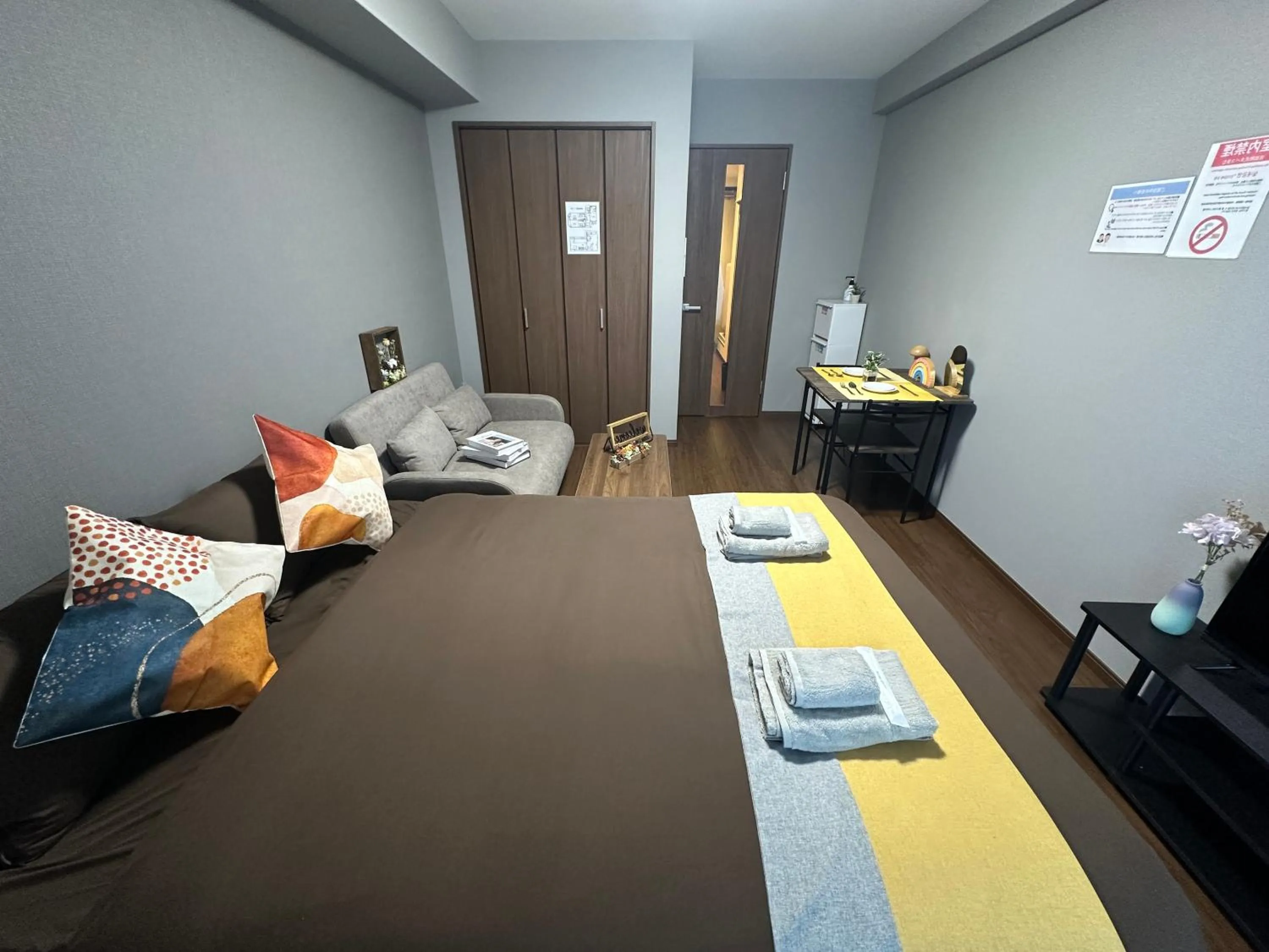 Bed in nestay apartment osaka ebisu