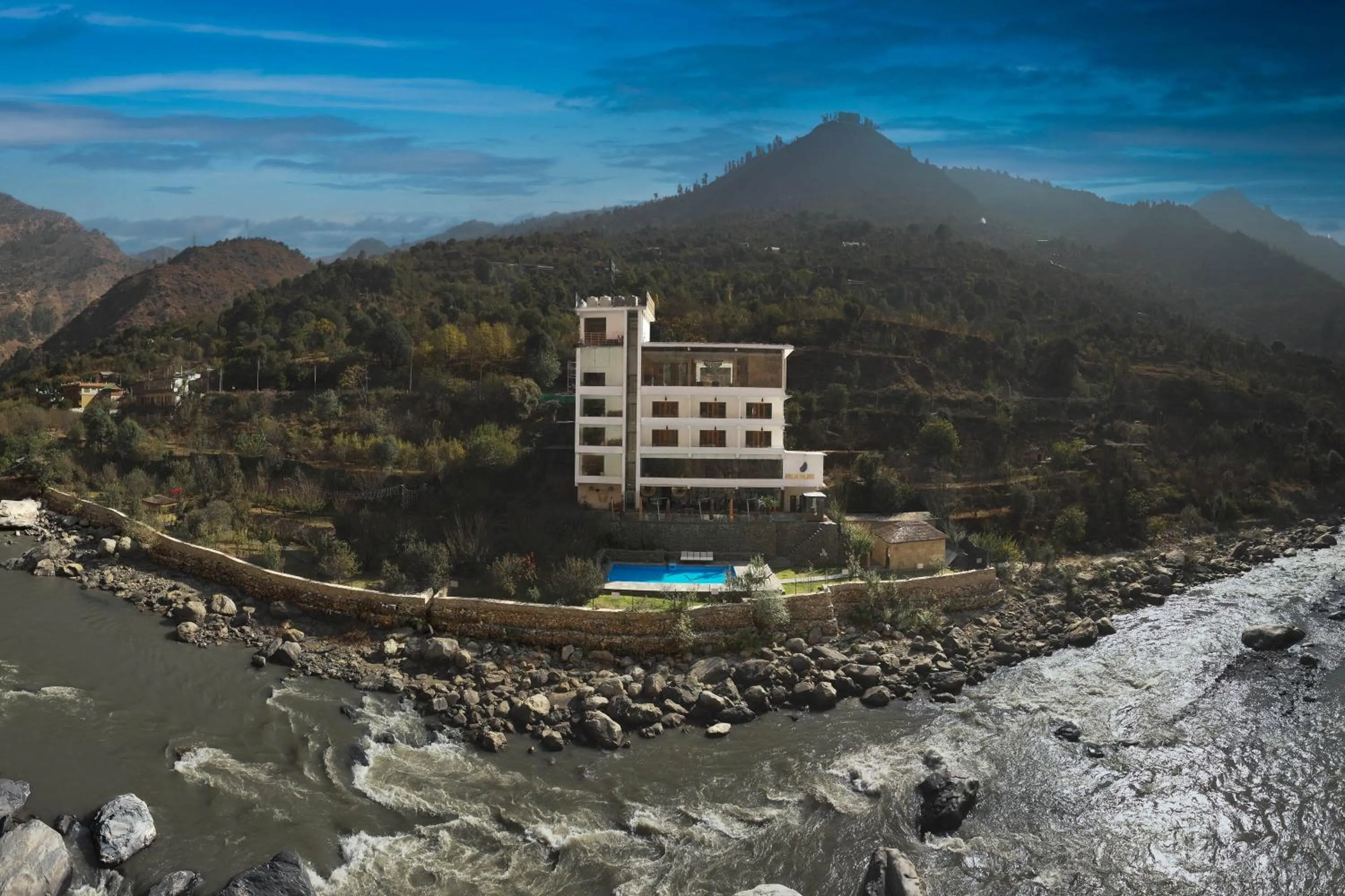 Property building in Echor Palm Bliss Riverside Resort & Spa Kasol