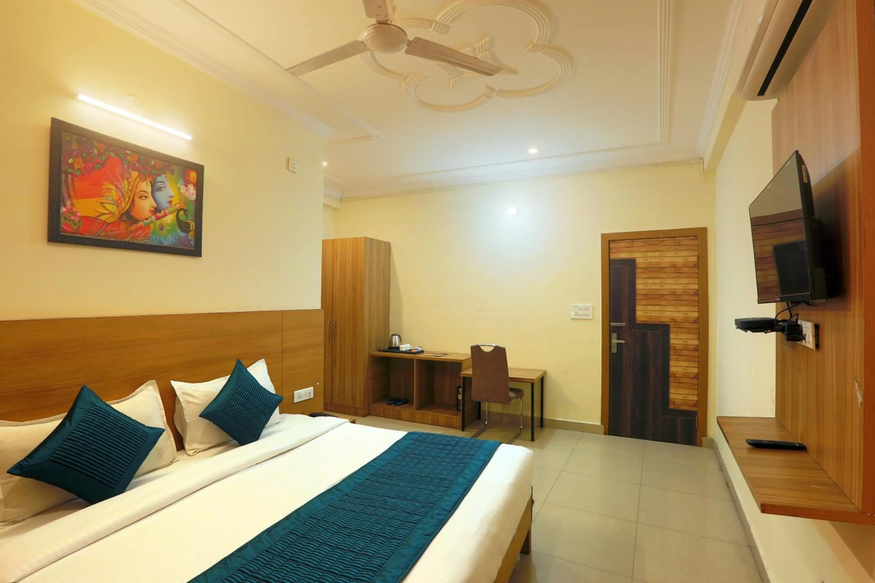 Communal lounge/ TV room, Bed in Hotel Lemon Suites & Banquet By Aura